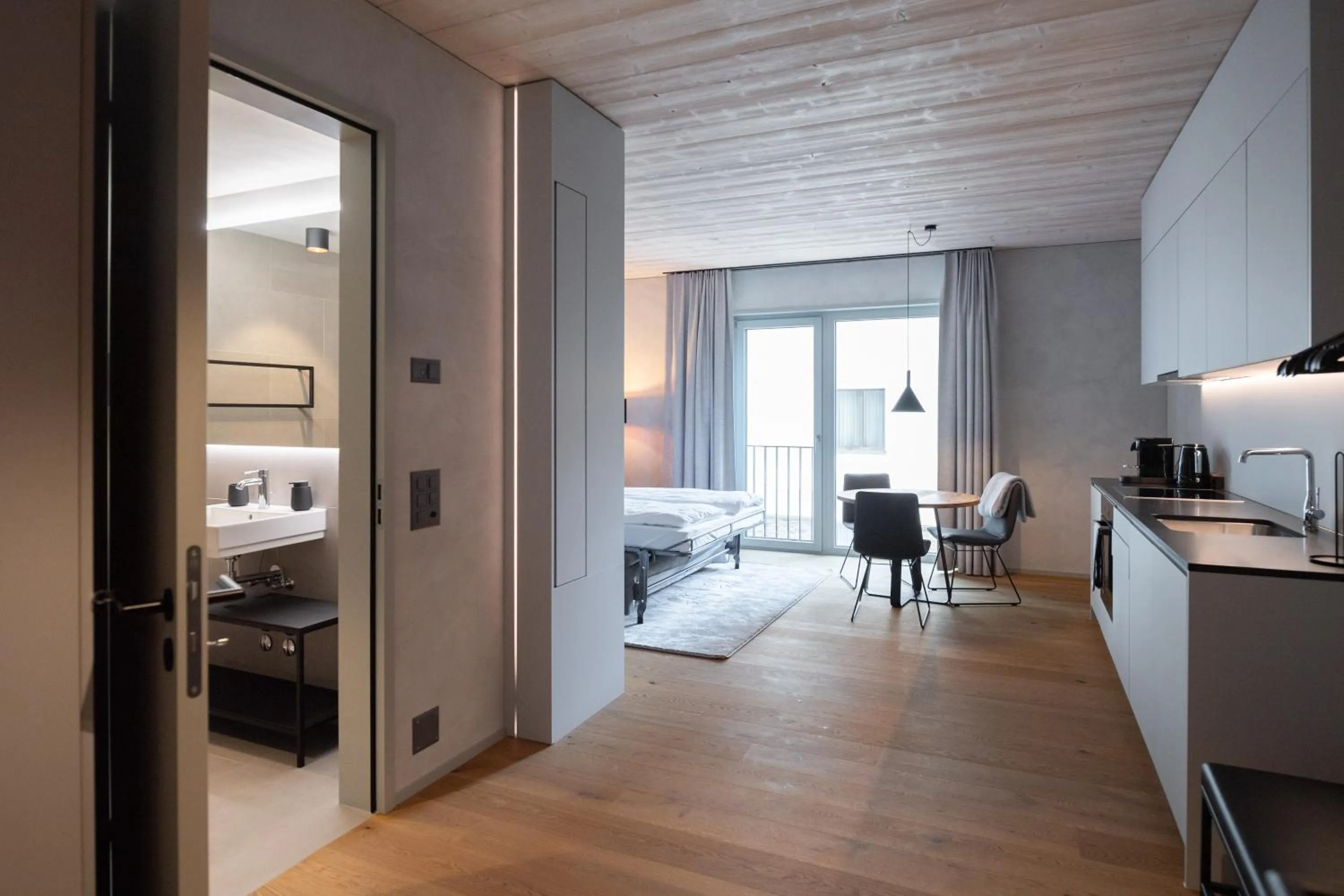 Bedroom, Bed in Andermatt Alpine Apartments