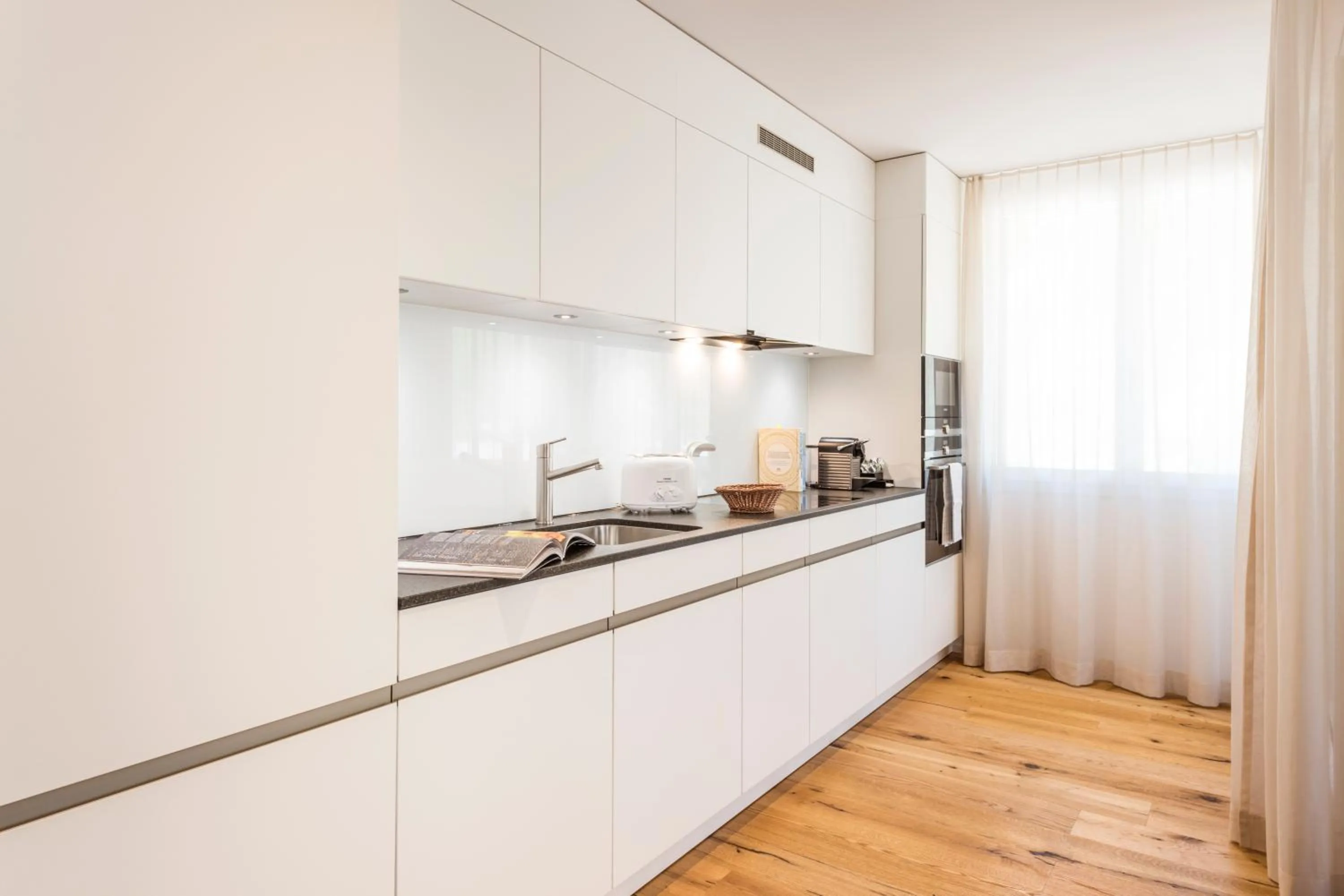 Kitchen or kitchenette in Andermatt Alpine Apartments