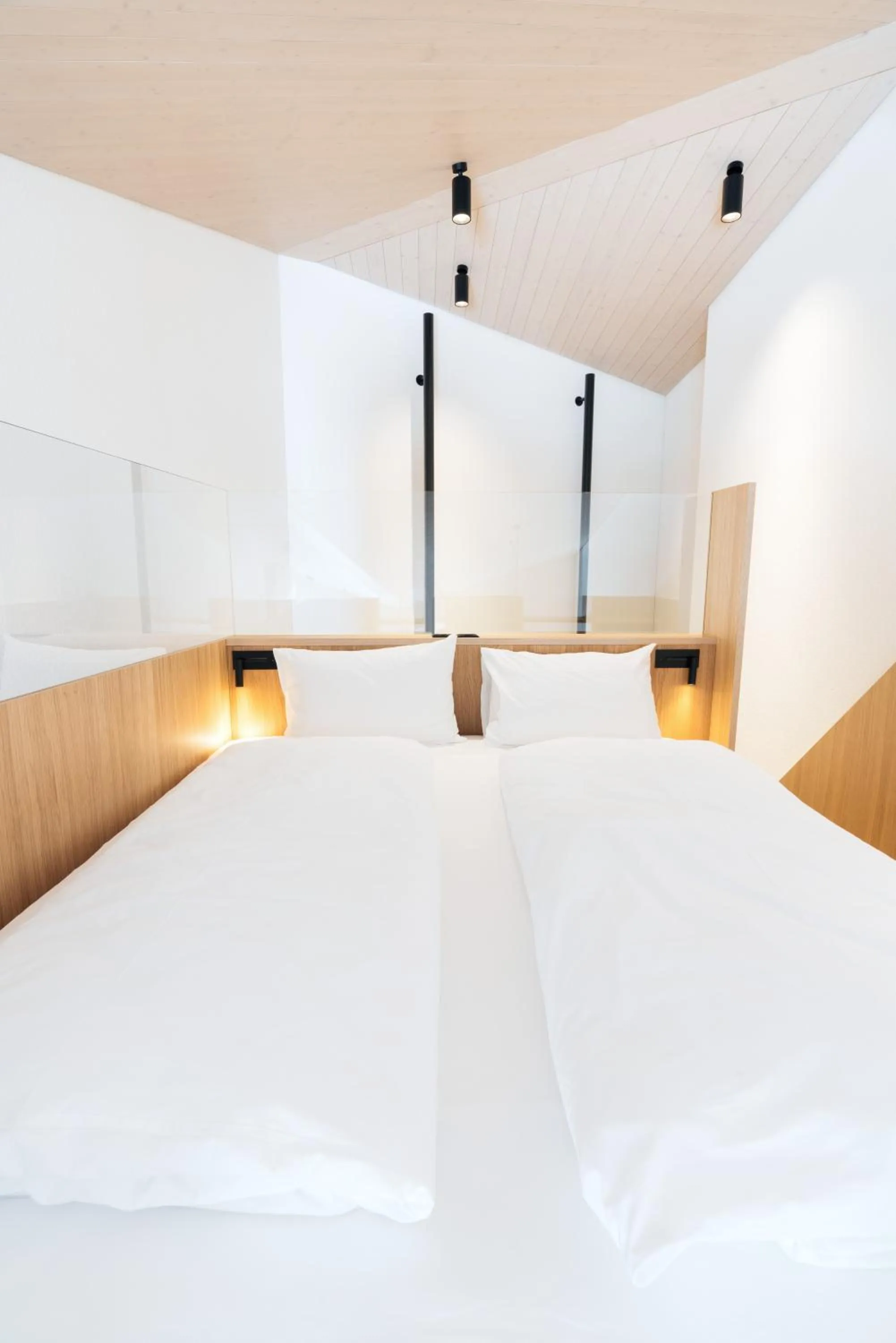 Bed in Andermatt Alpine Apartments