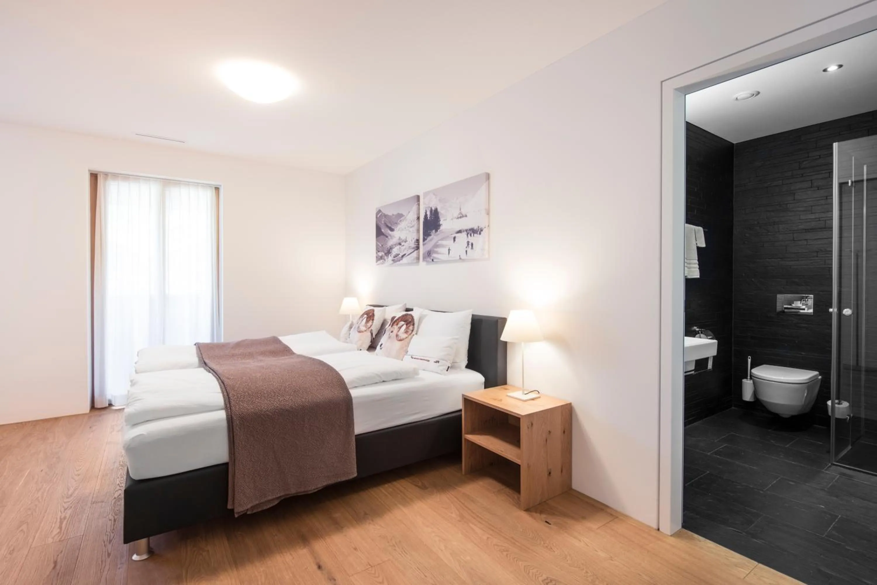 Shower, Bed in Andermatt Alpine Apartments