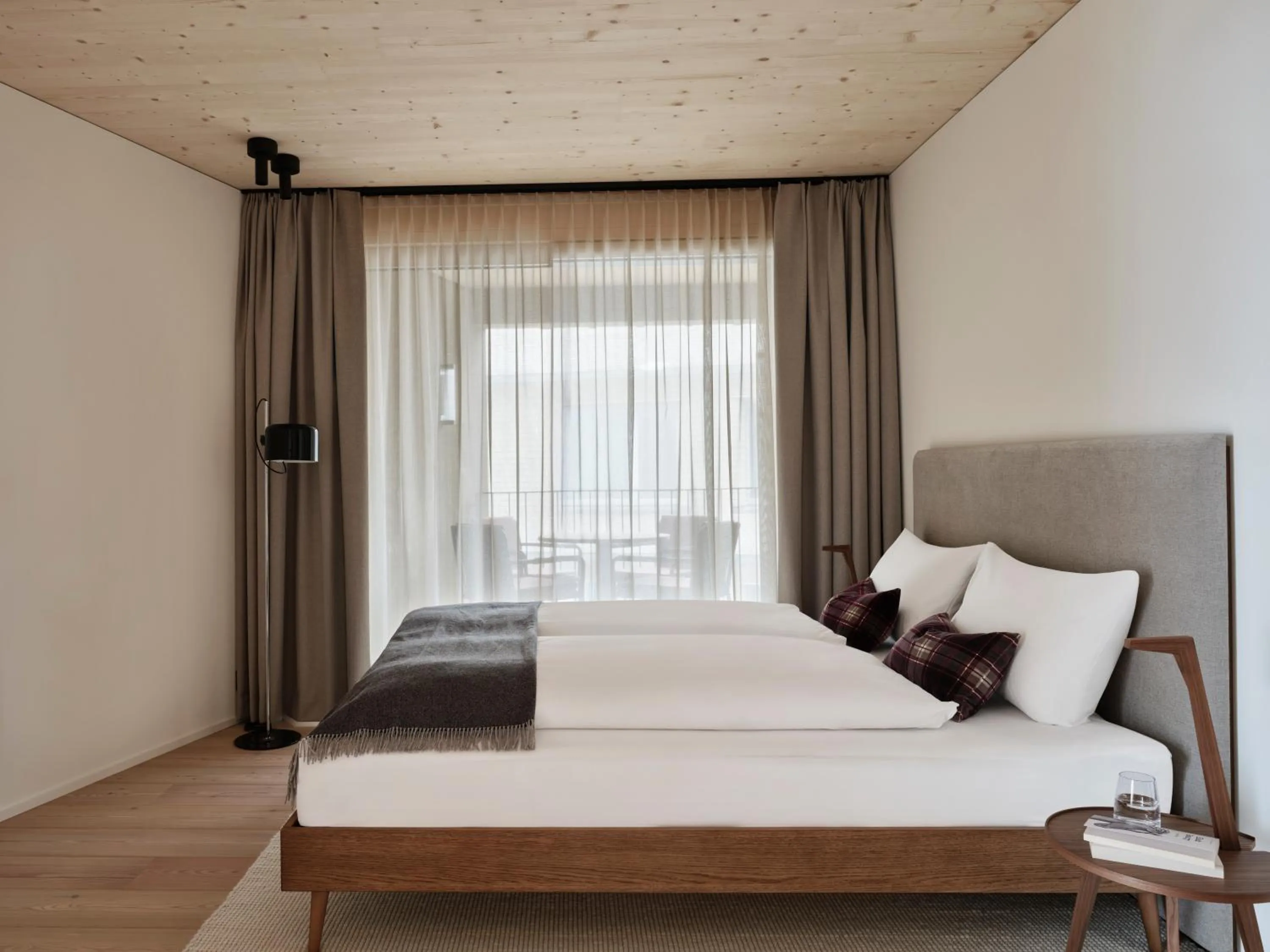 Bed in Andermatt Alpine Apartments