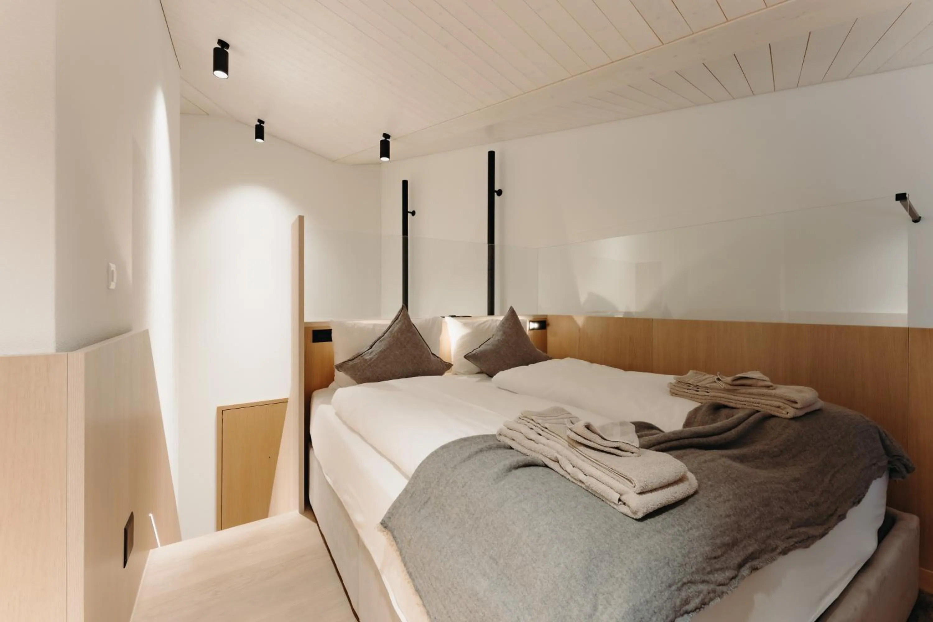 Bed in Andermatt Alpine Apartments