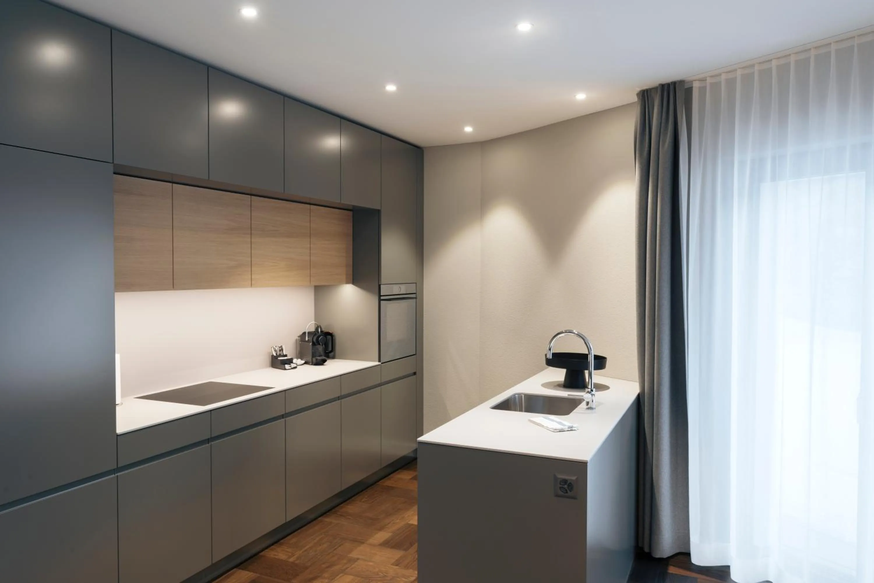 Kitchen or kitchenette in Andermatt Alpine Apartments