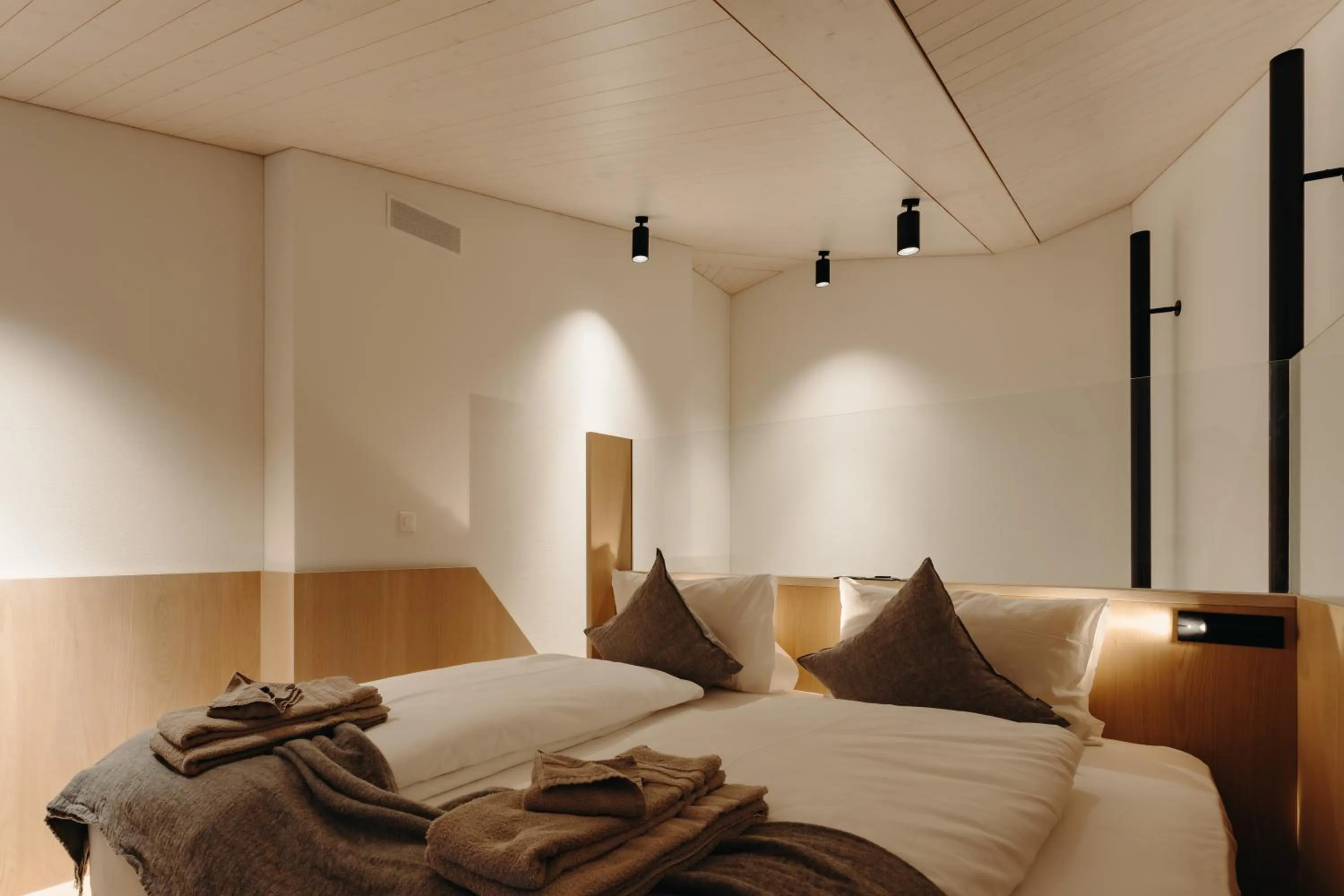 Bed in Andermatt Alpine Apartments