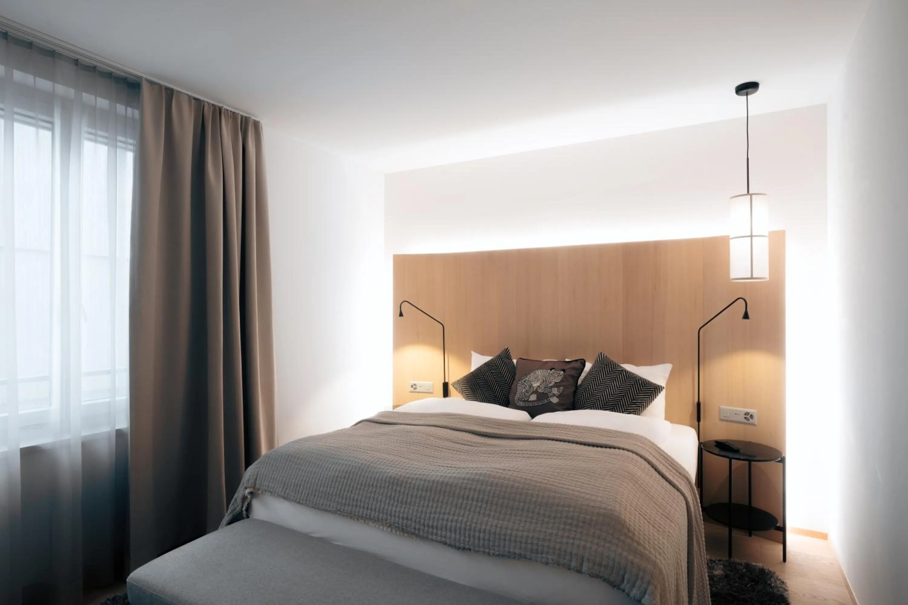 Bed in Andermatt Alpine Apartments