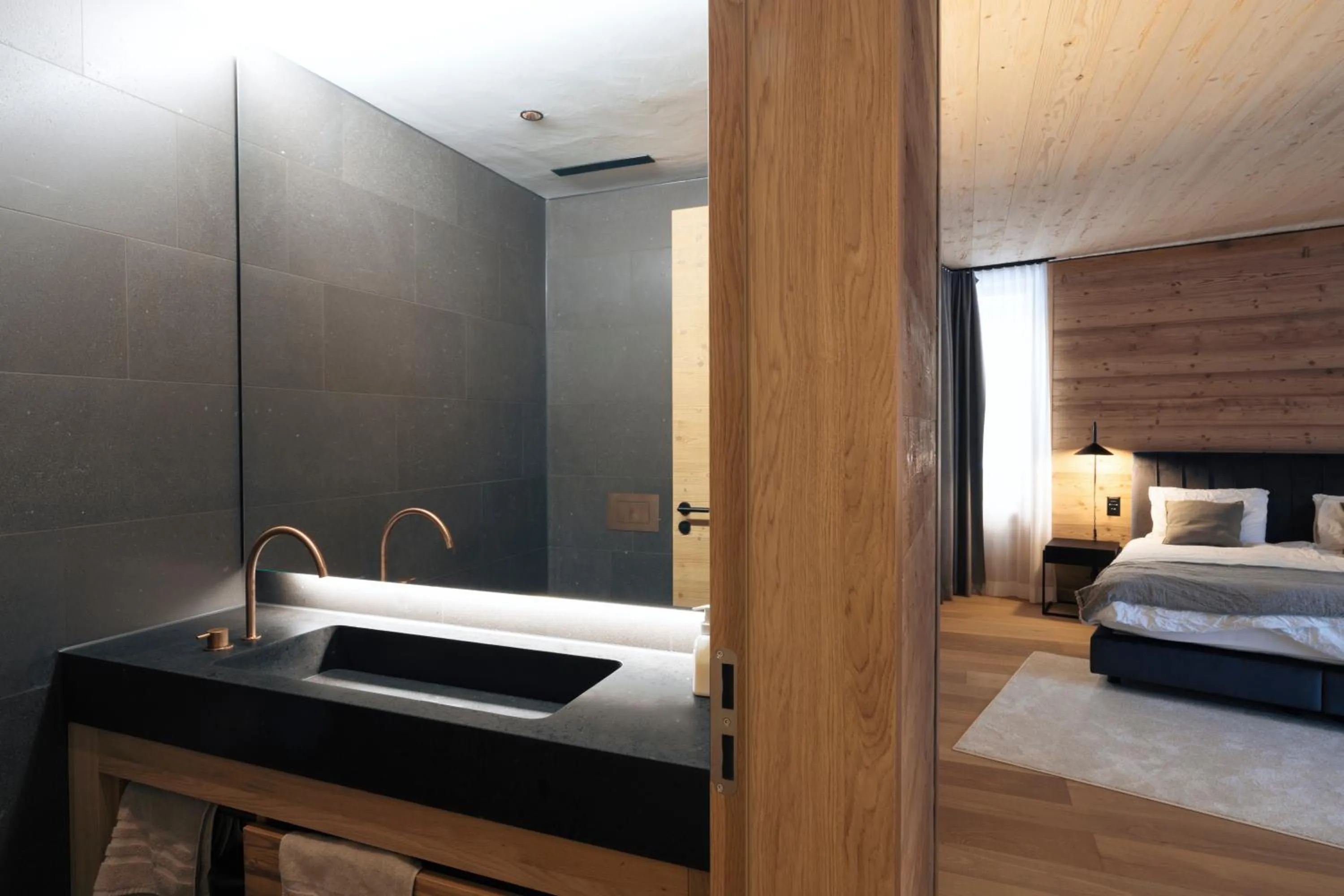Bathroom, Bed in Andermatt Alpine Apartments