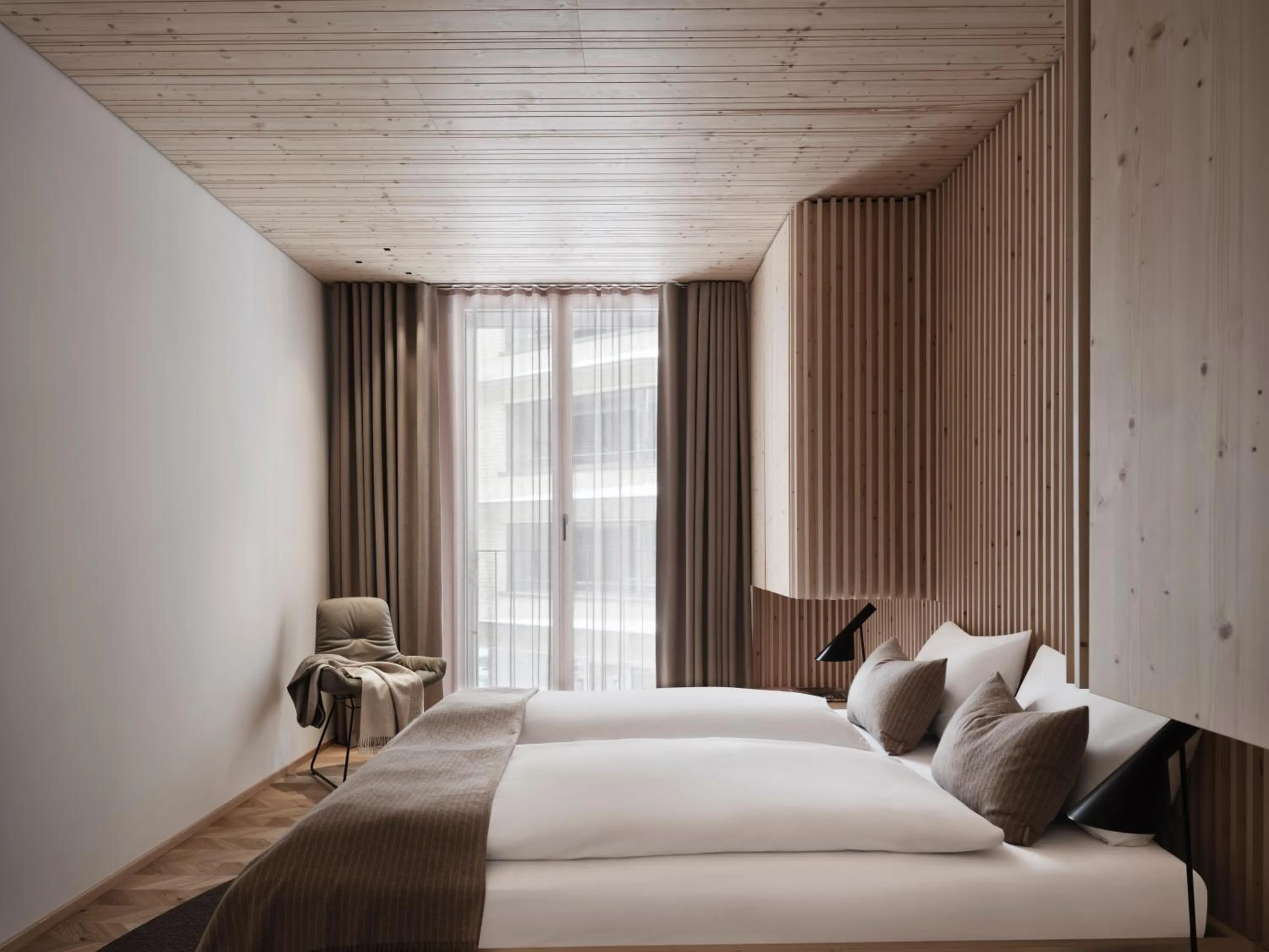 Bed in Andermatt Alpine Apartments