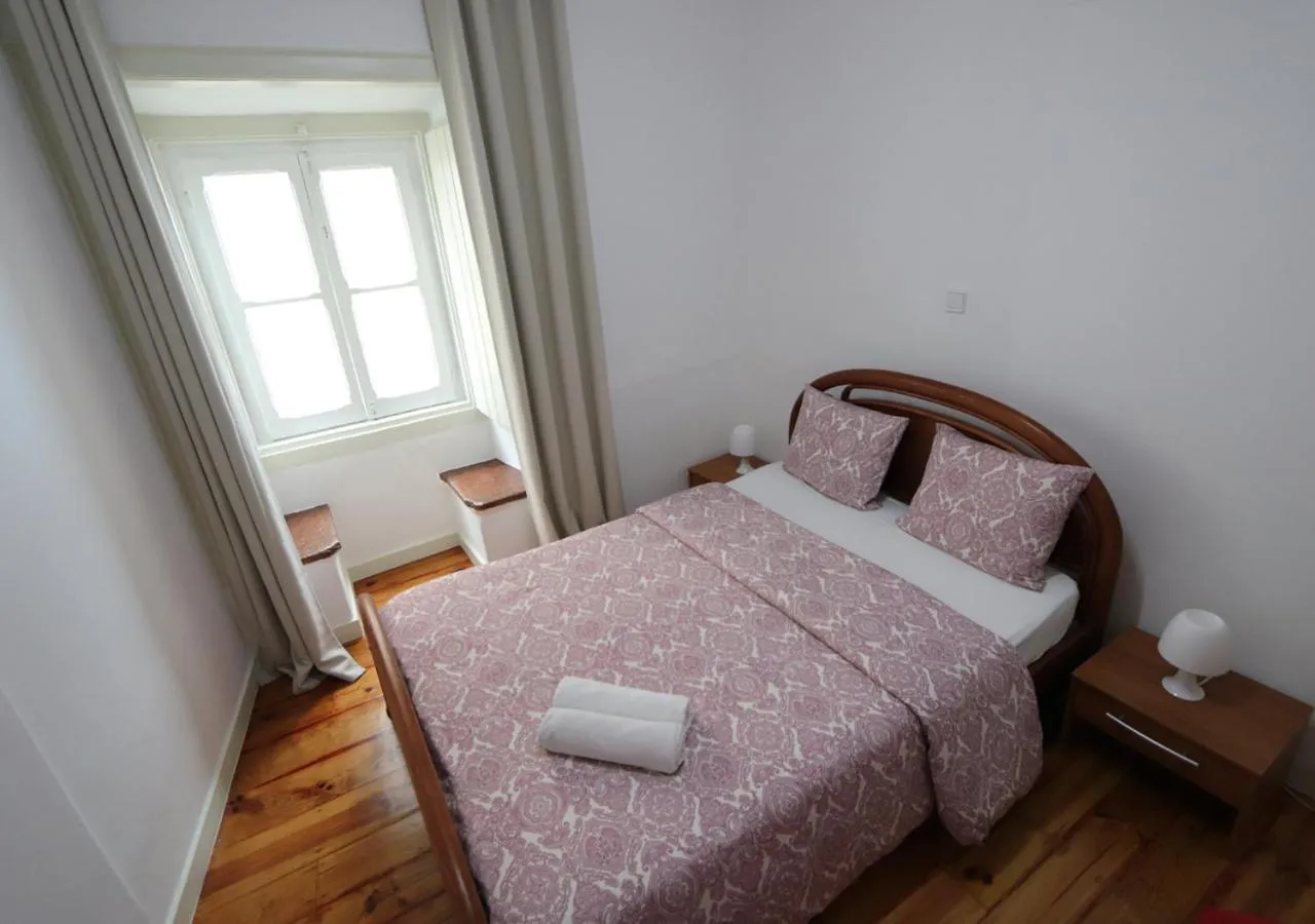 Bed in Welcome Guest House