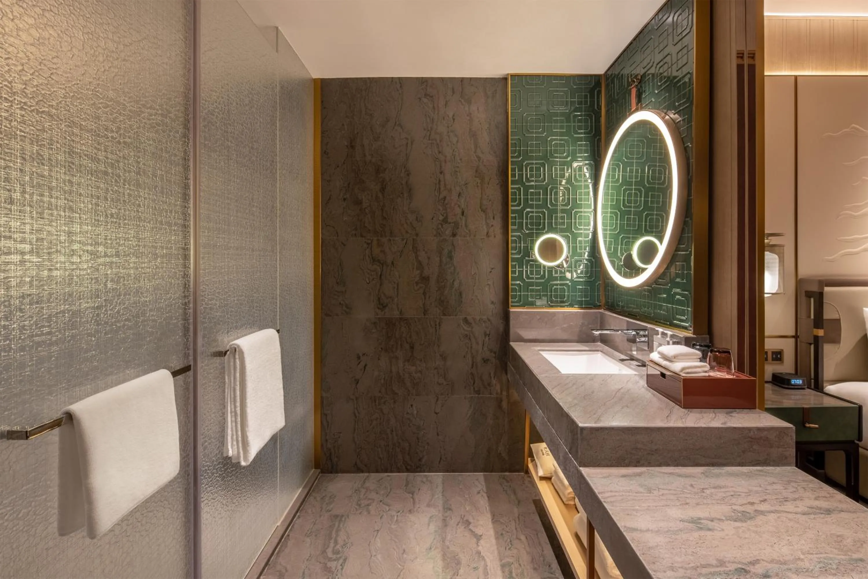 Bathroom, Bed in HUALUXE Hotels and Resorts Qingdao Licang, an IHG Hotel