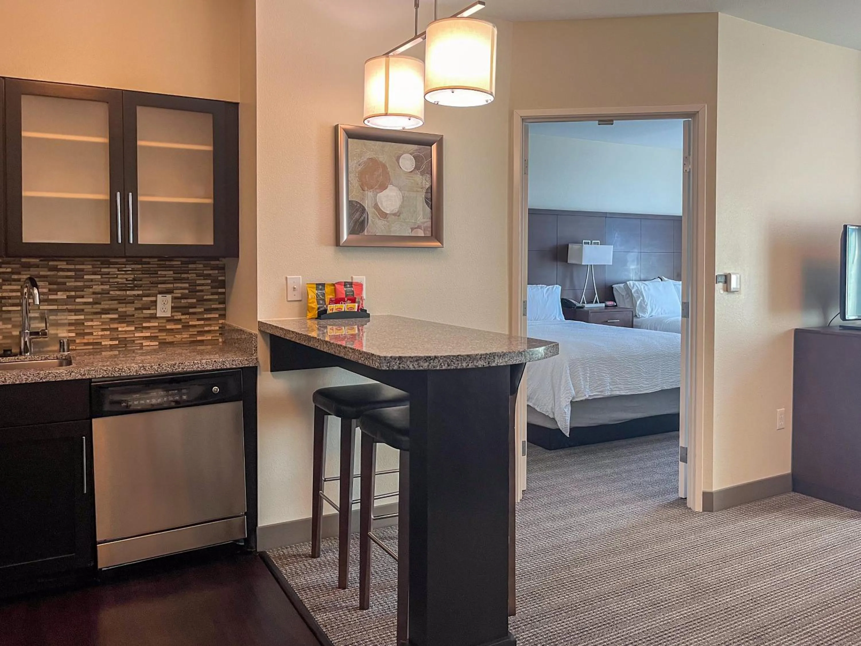 Dining area, Bed in Staybridge Suites Carlsbad/San Diego by IHG