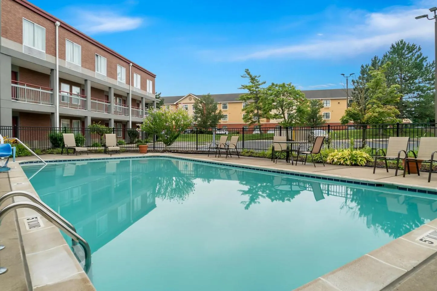 Swimming pool in HomeTowne Studios by Red Roof Auburn Hills