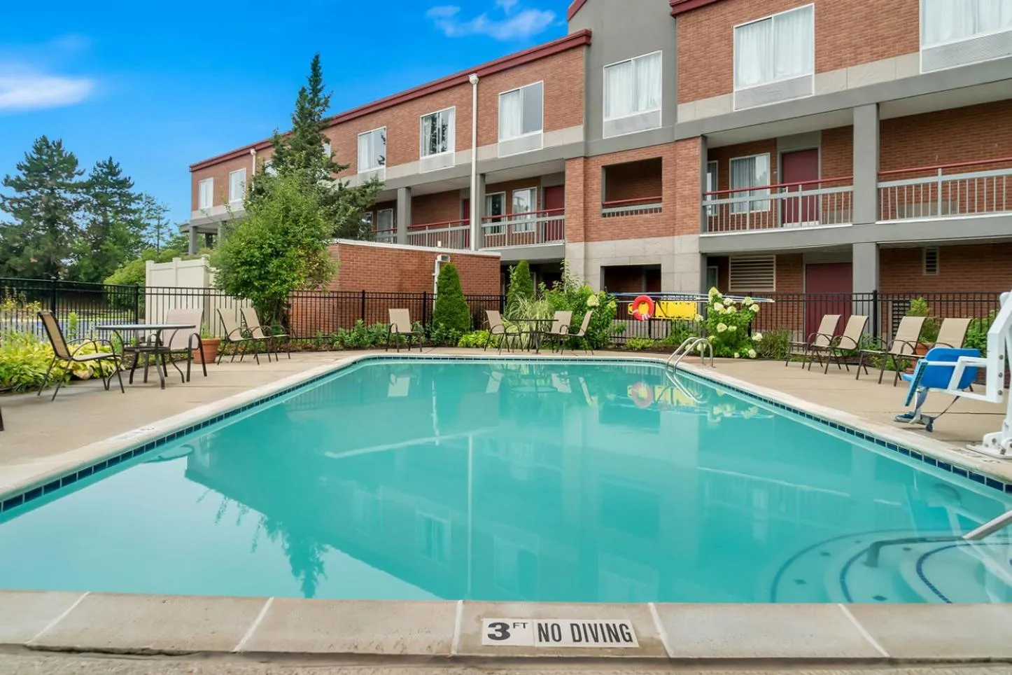 Swimming pool in HomeTowne Studios by Red Roof Auburn Hills