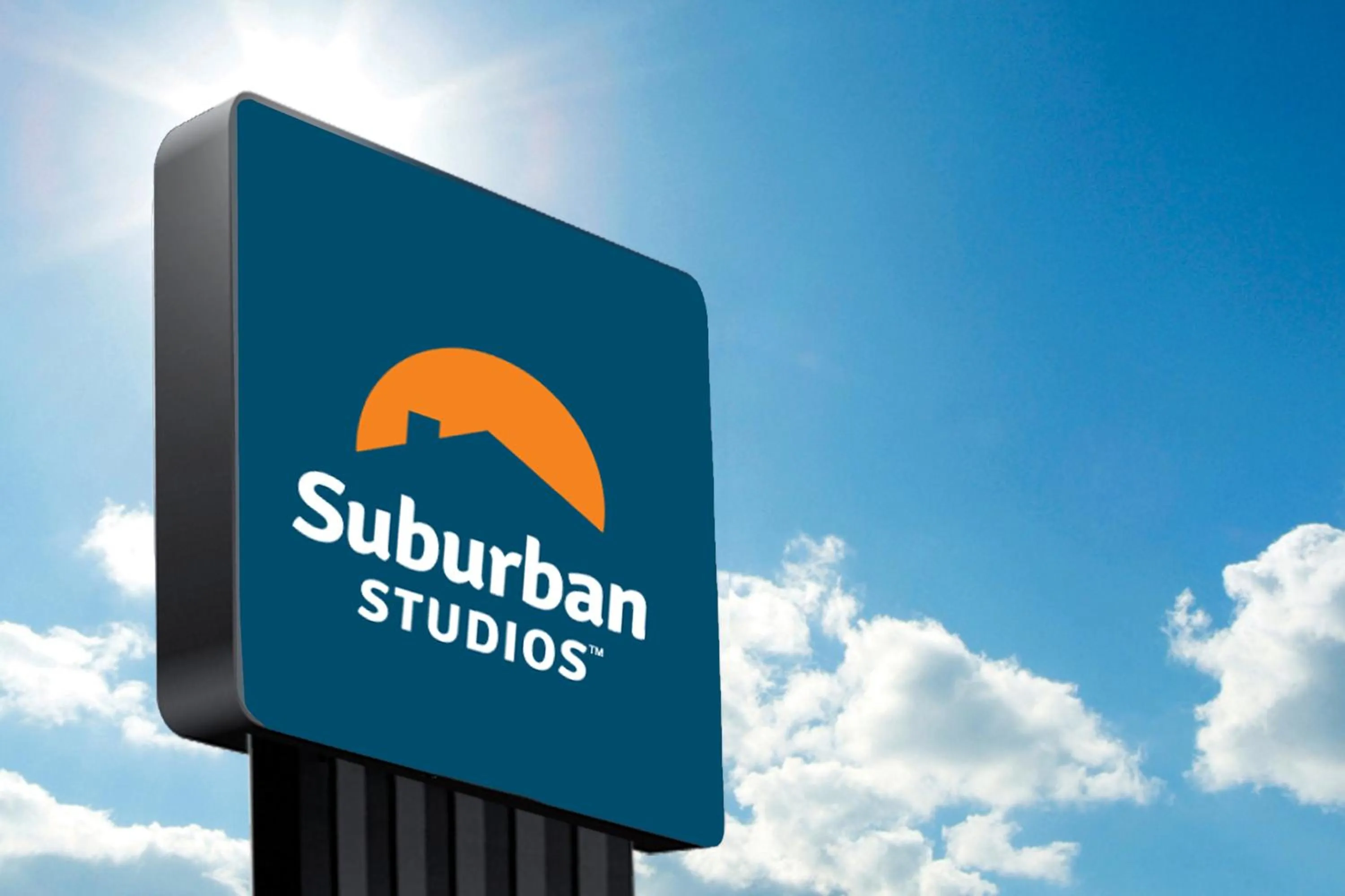 Property logo or sign in Suburban Studios Tysons Corner