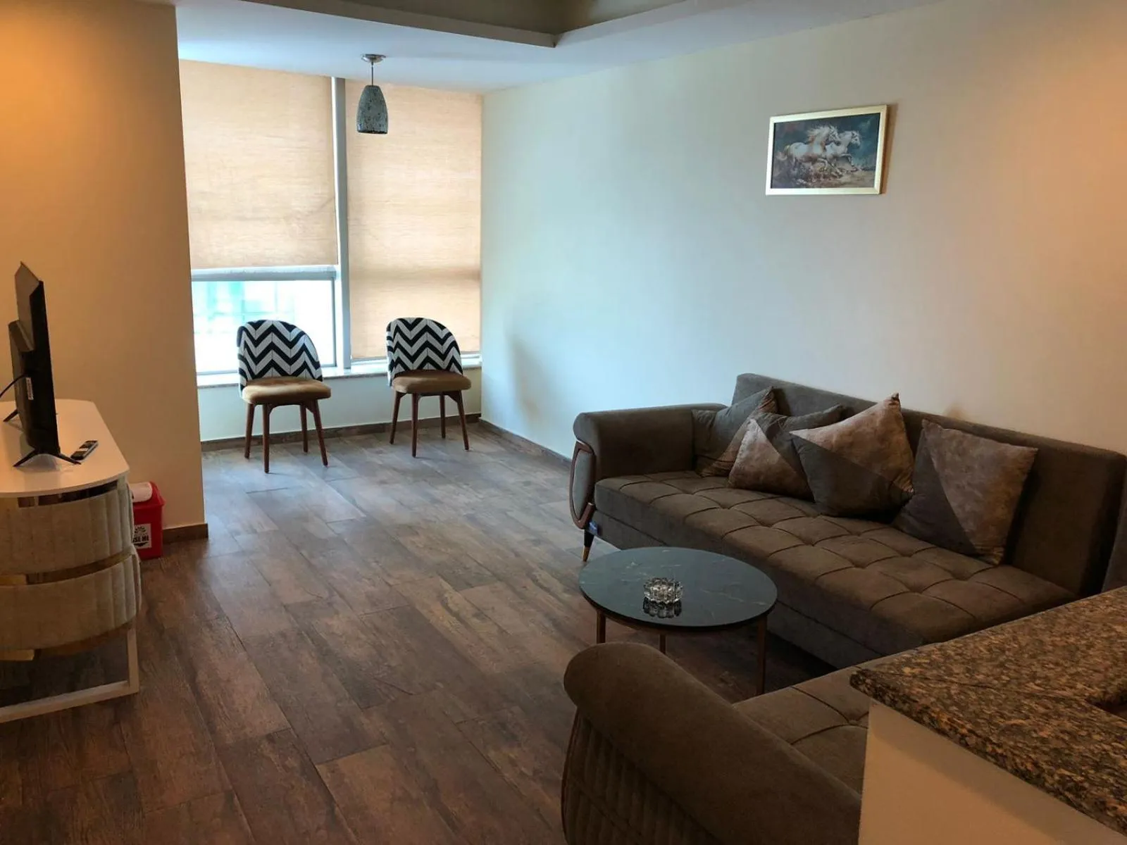 Living room in The Centaurus Apartments