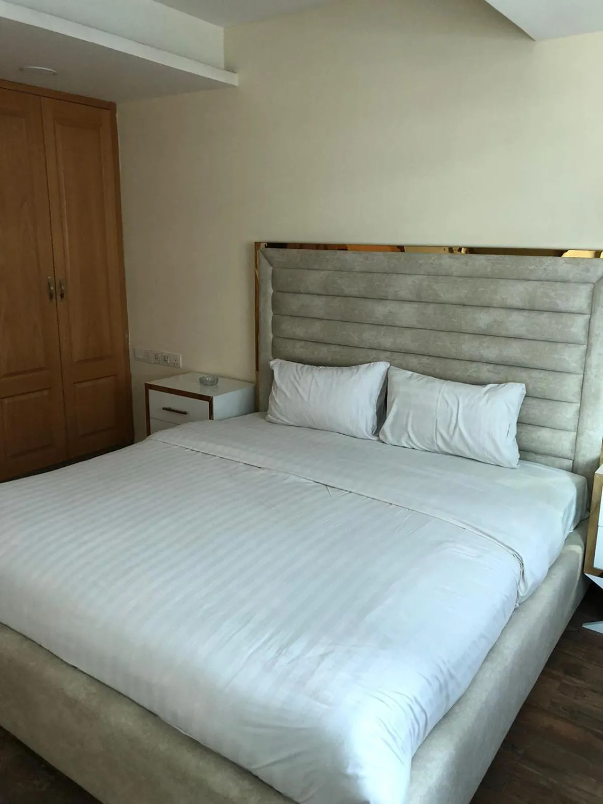 Bed in The Centaurus Apartments