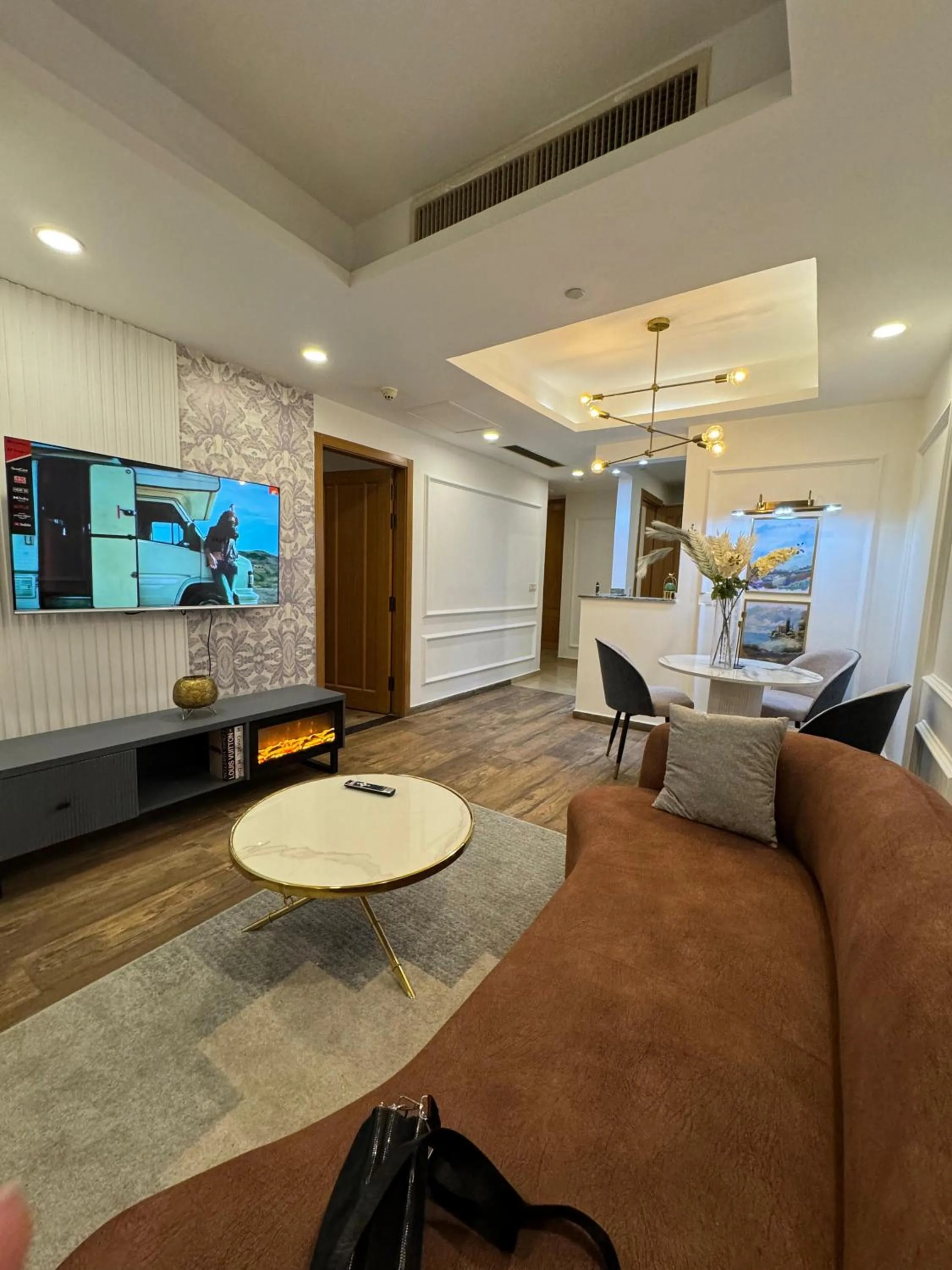 Communal lounge/ TV room in The Centaurus Apartments