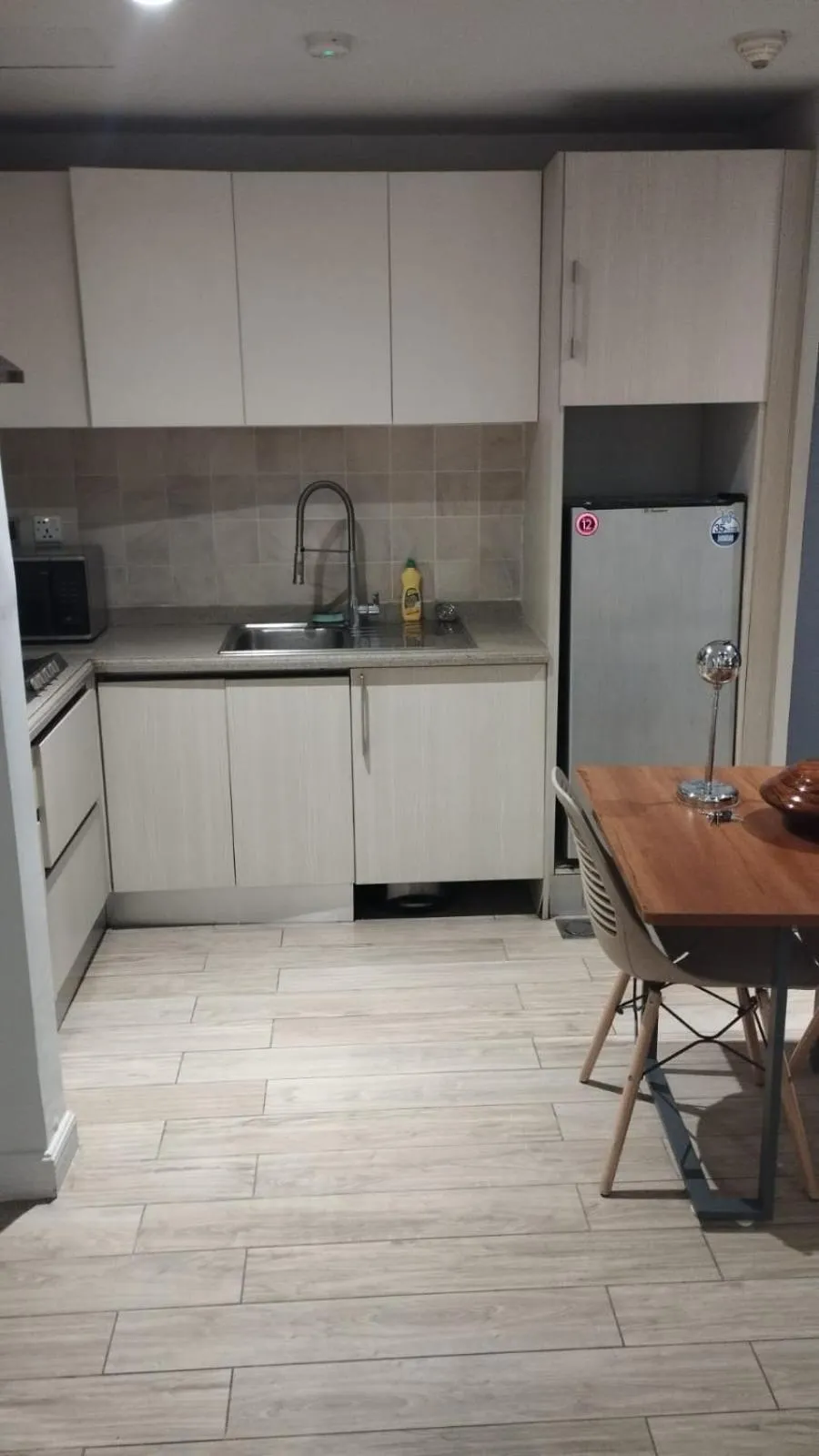 Kitchen or kitchenette in The Centaurus Apartments