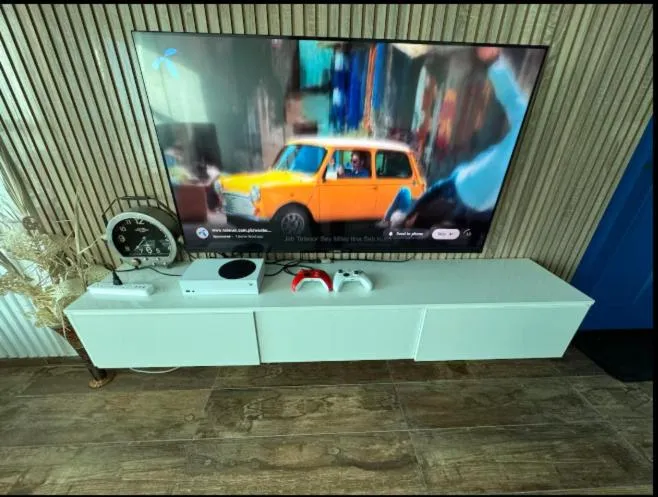 Communal lounge/ TV room in The Centaurus Apartments