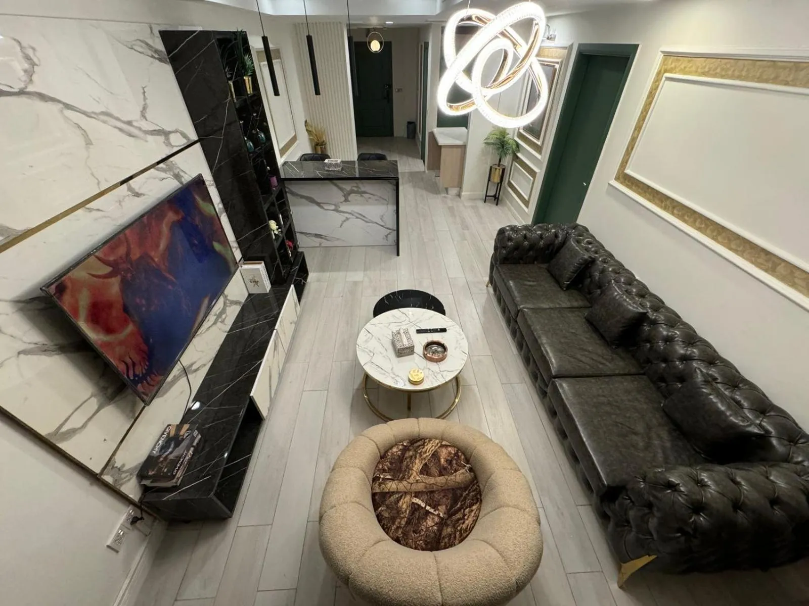 Communal lounge/ TV room in The Centaurus Apartments