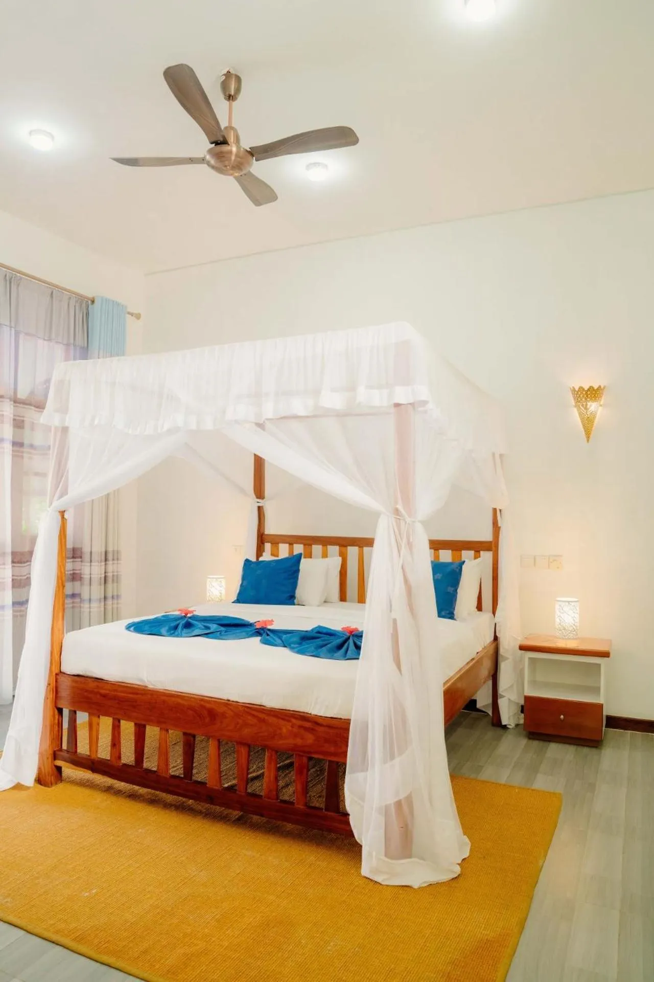 Swimming pool, Bed in Indigo Beach Zanzibar