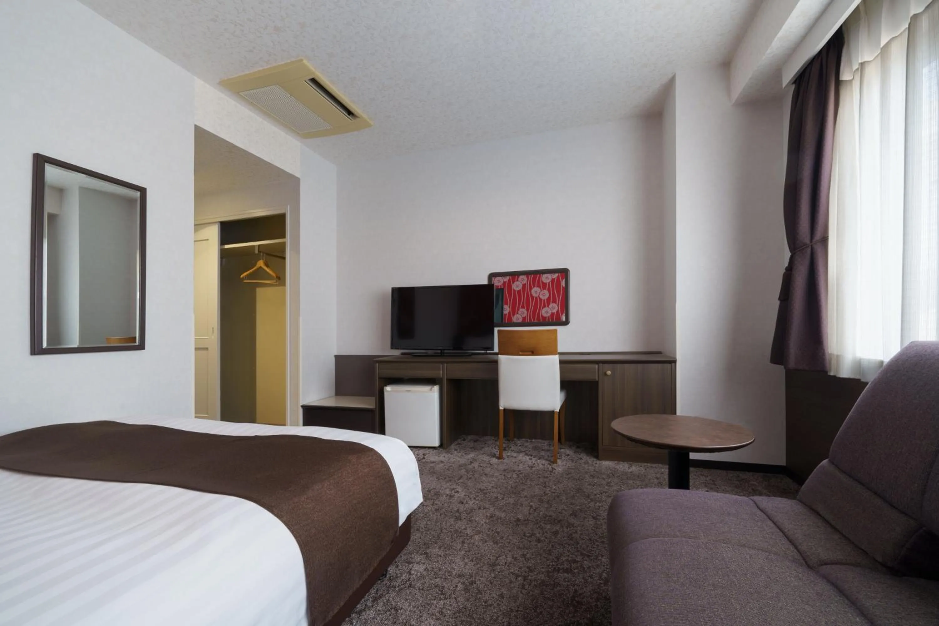 Bed in Hotel Centmain Nagoya