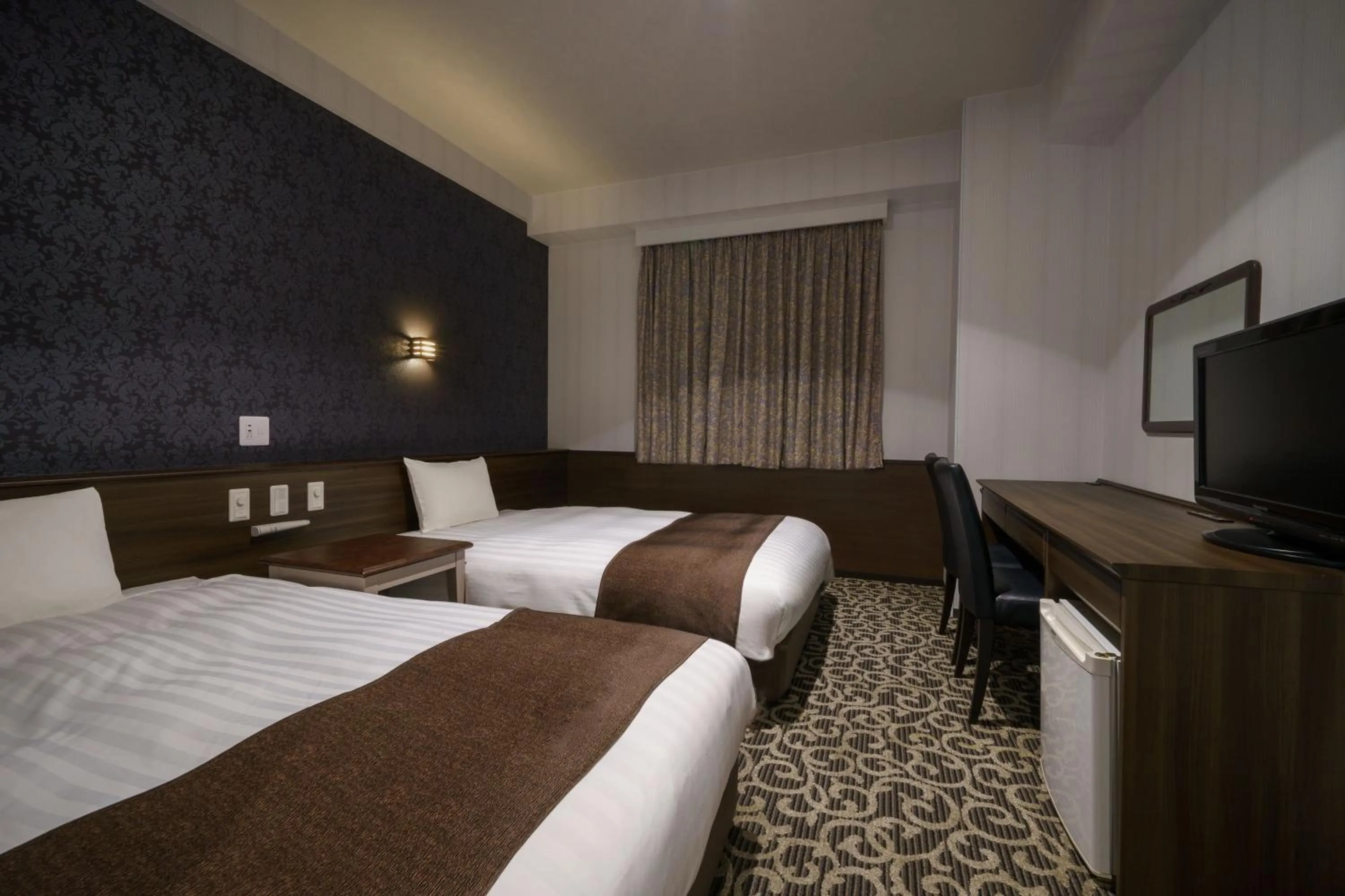 Bed in Hotel Centmain Nagoya