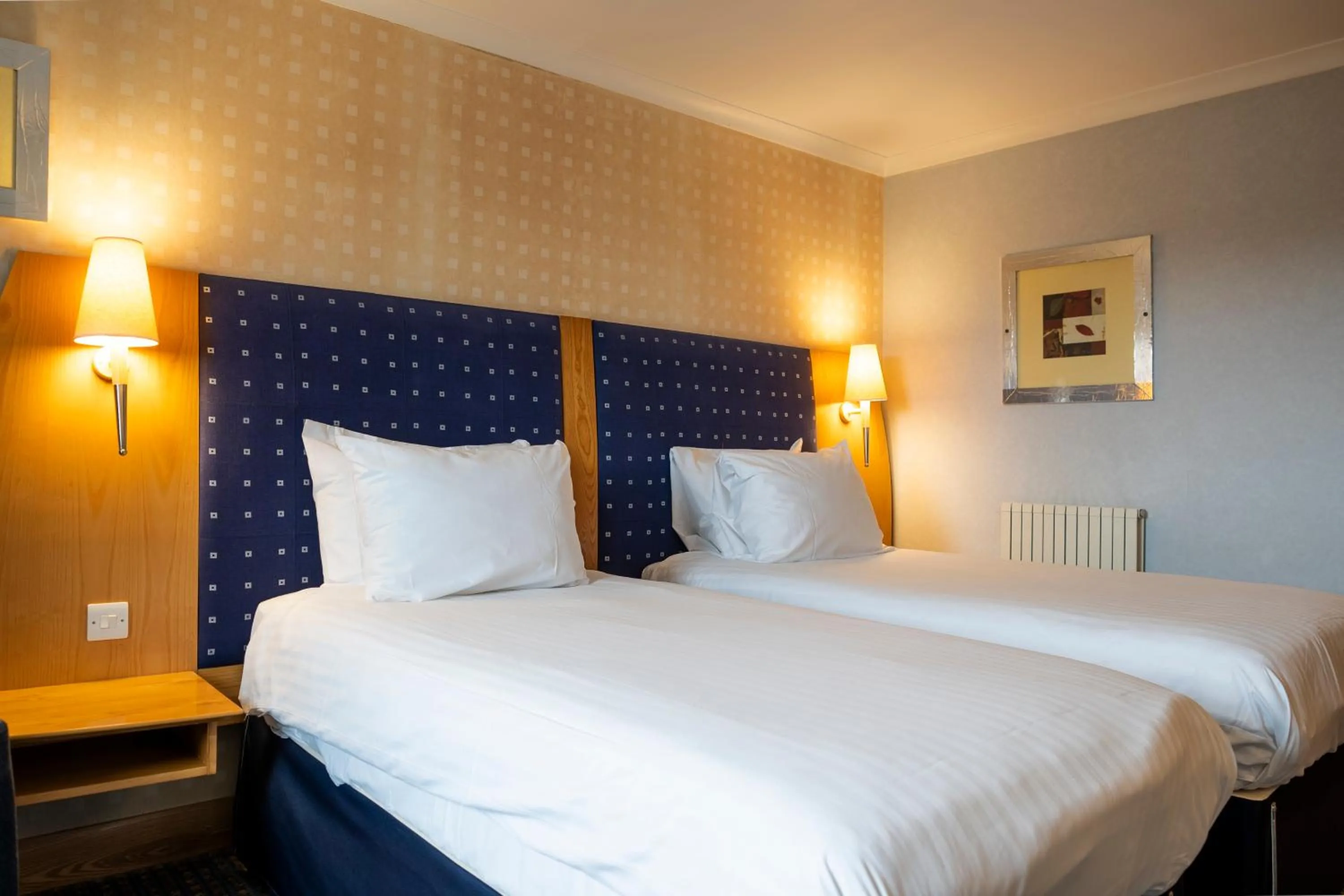 Bed in The Bolton Stadium Hotel, a member of Radisson Individuals