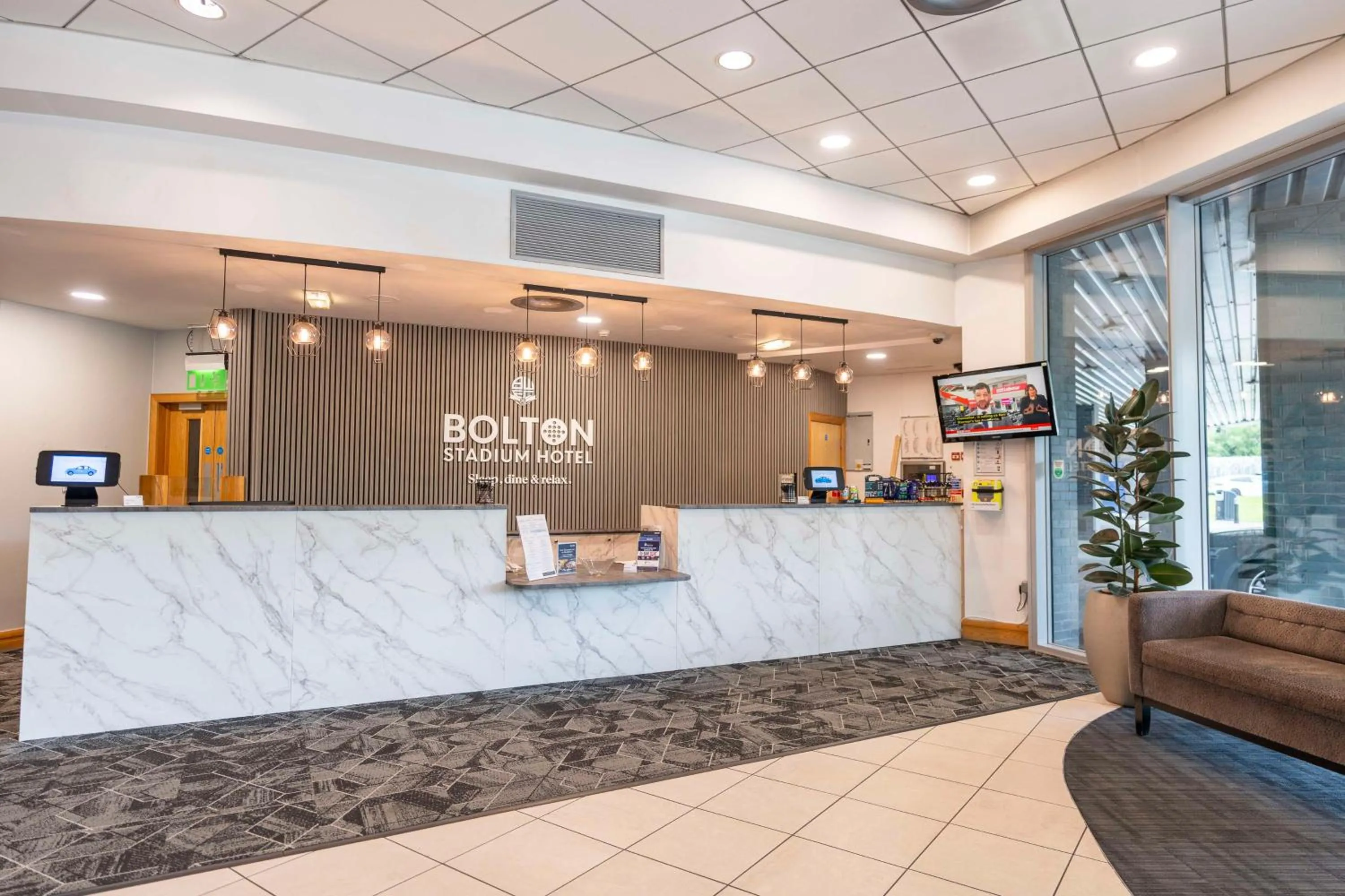 Lobby or reception in The Bolton Stadium Hotel, a member of Radisson Individuals