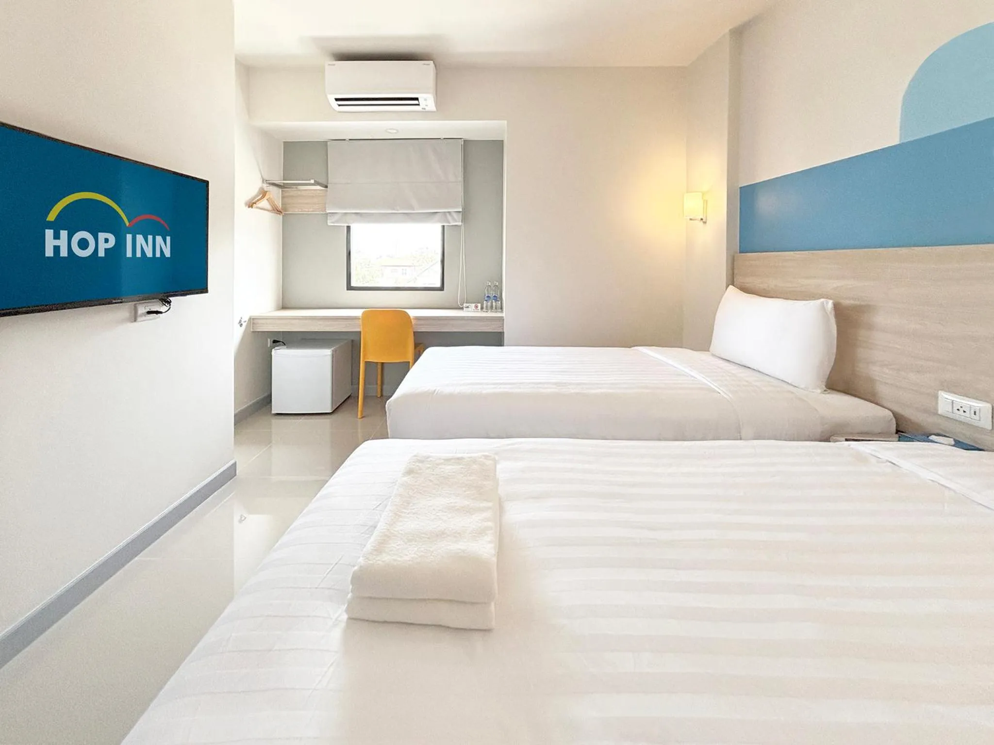 Bed in HOP INN Suphanburi