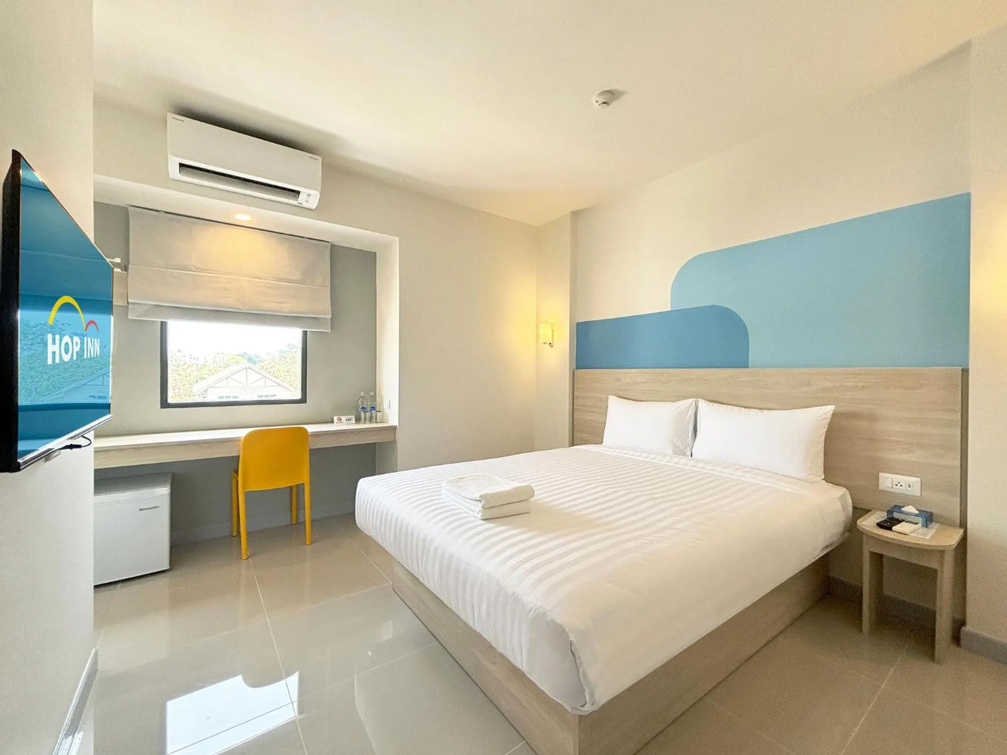 Bed in HOP INN Suphanburi