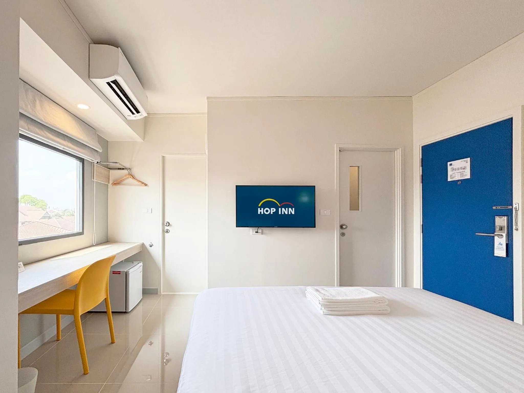 Bed in HOP INN Suphanburi