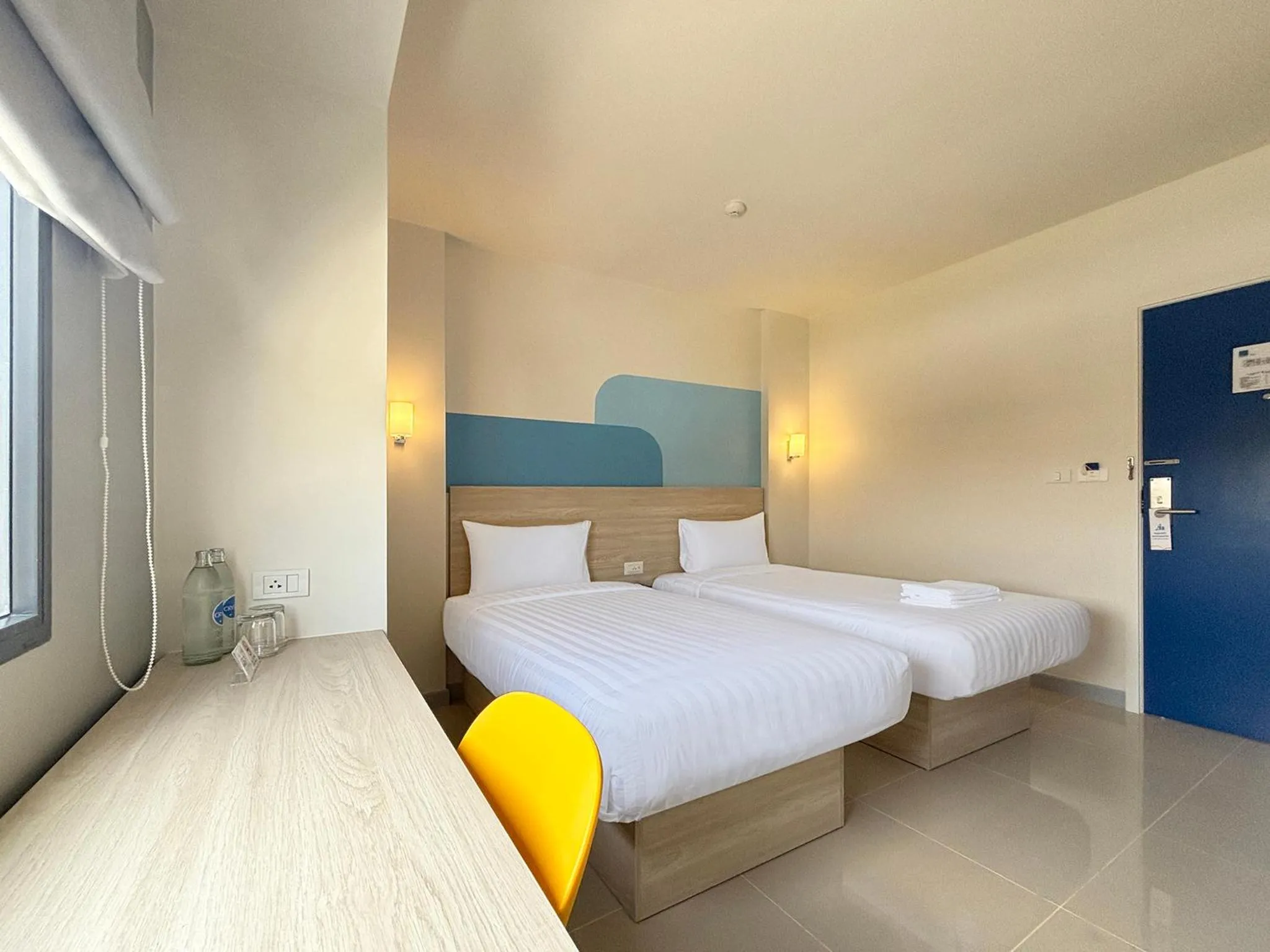 Bed in HOP INN Suphanburi