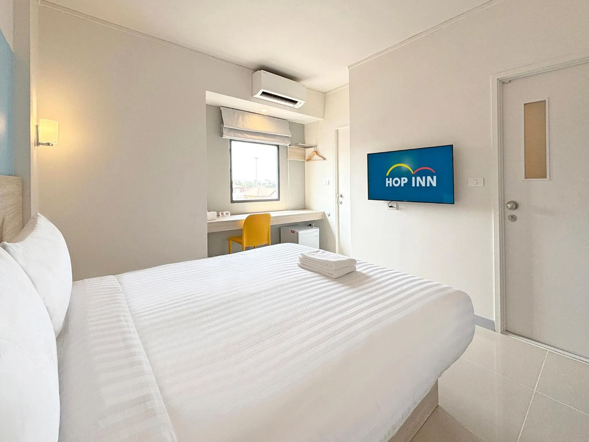 Bed in HOP INN Suphanburi