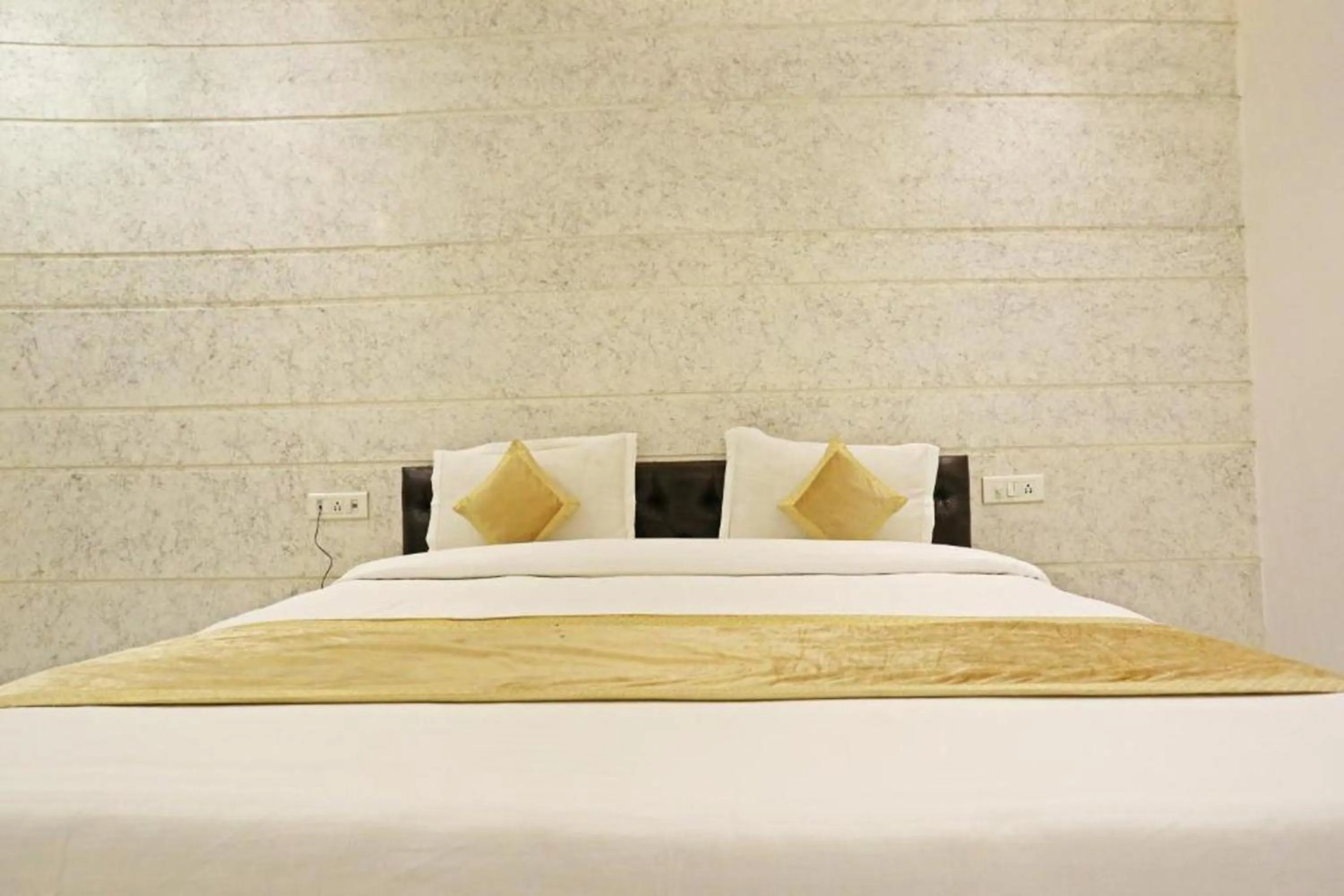 Bed in HOTEL MGM RESIDENCY