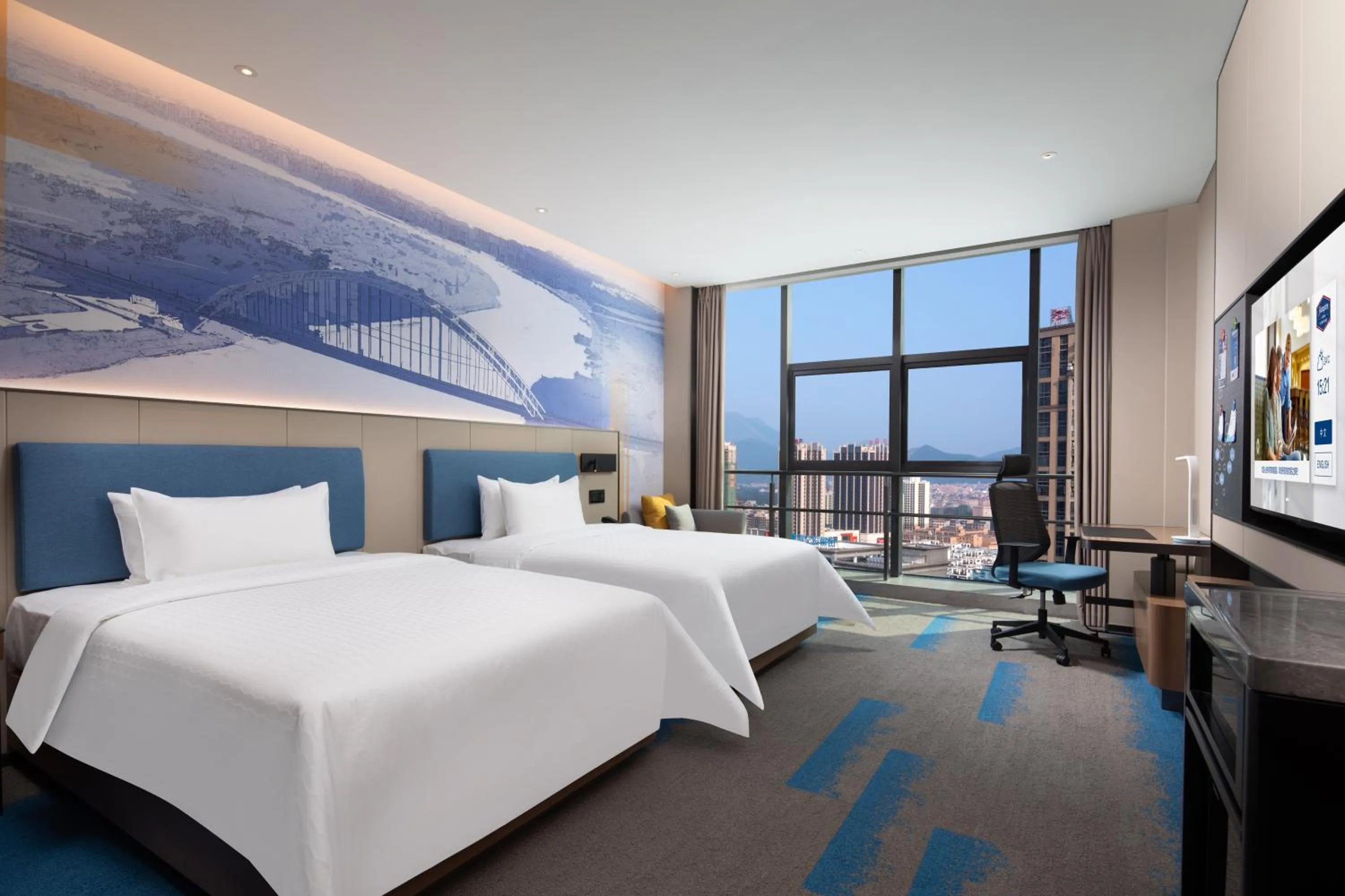 Photo of the whole room, Bed in Hampton by Hilton Guigang