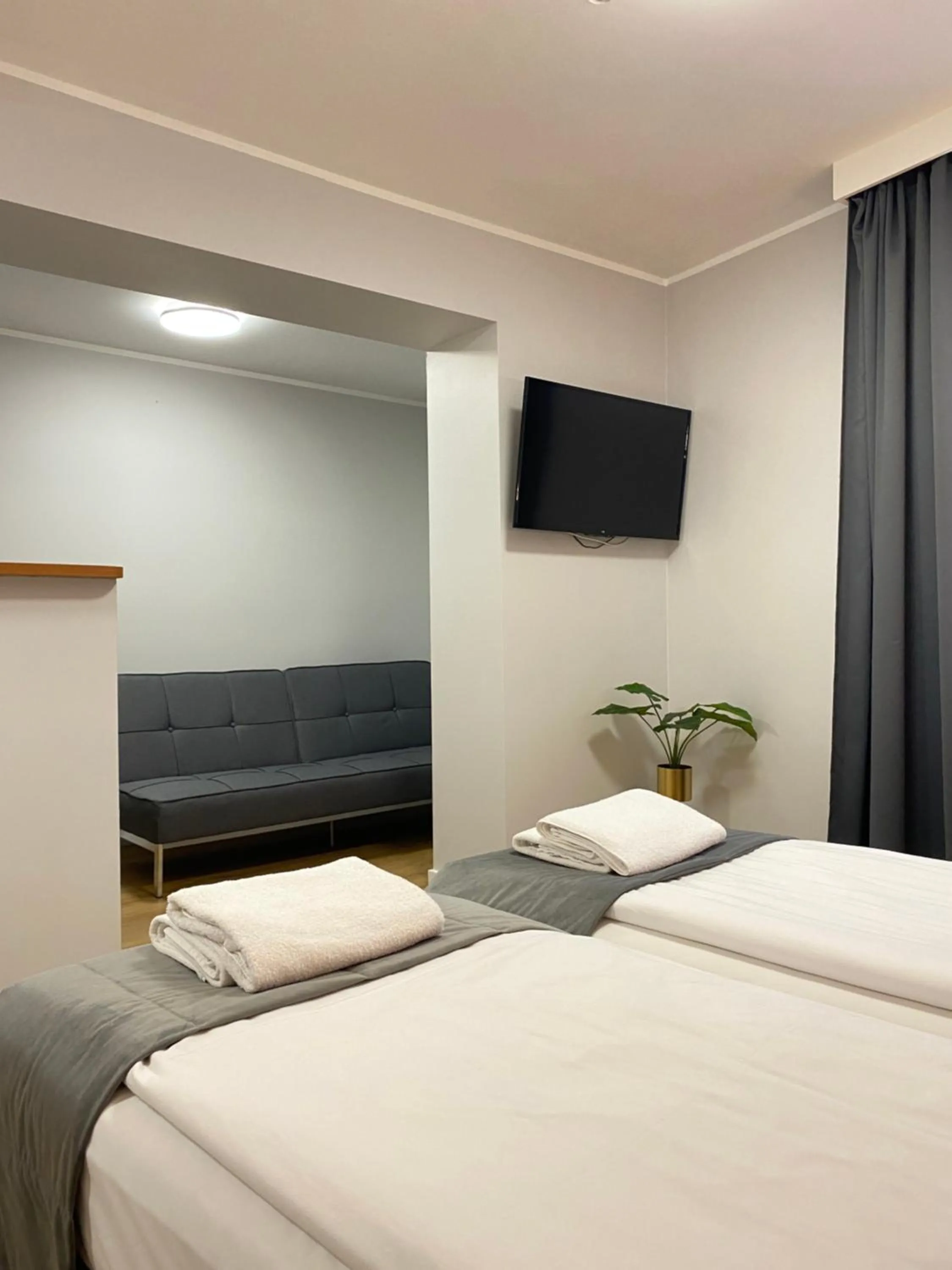 Bed in Cube House Aparthotel