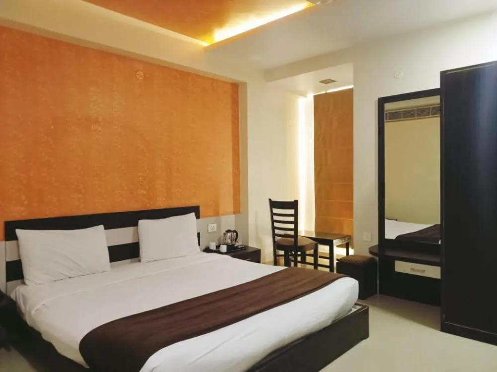 Bedroom in Hotel Yash Regency