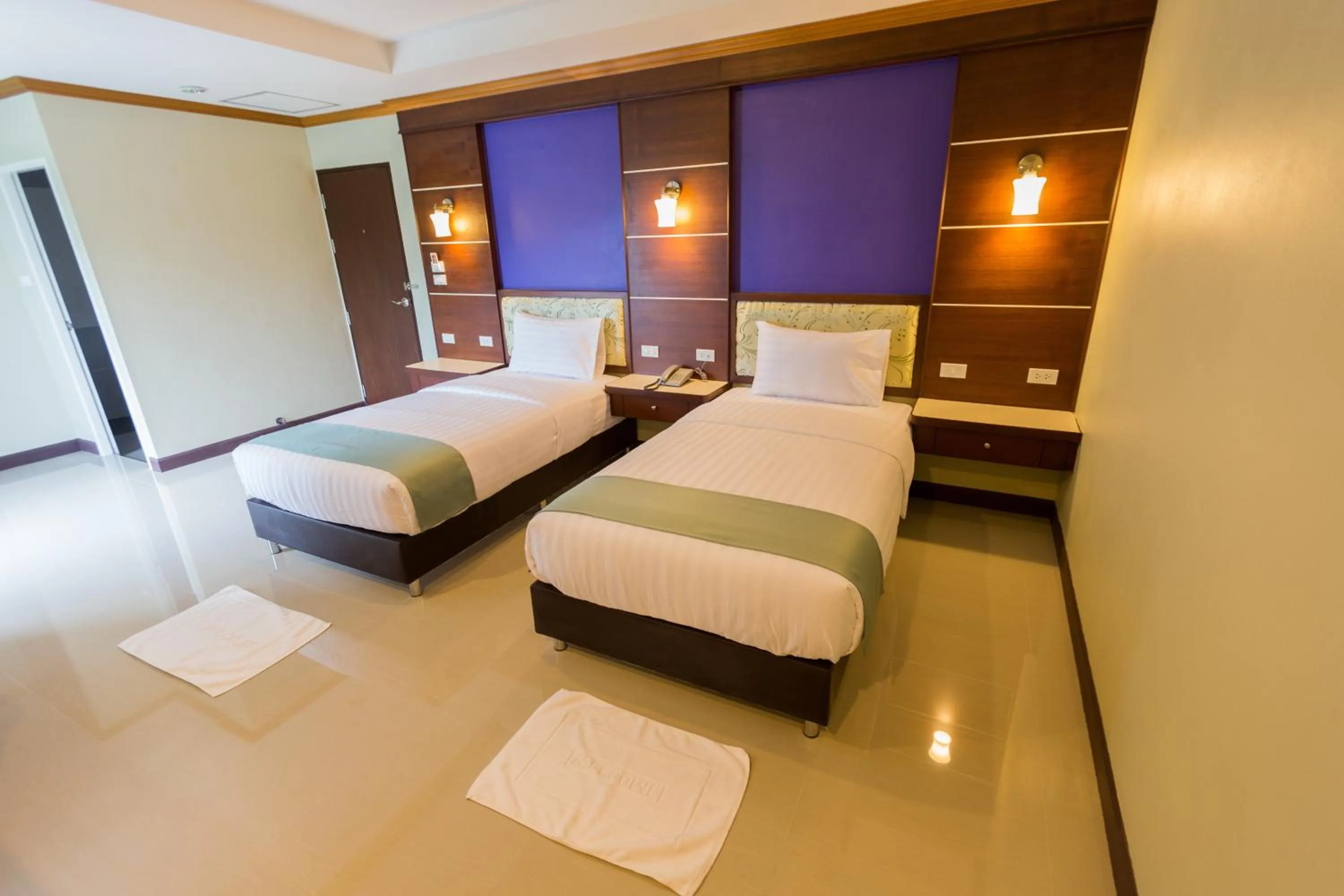 Bed in Thungtawan Hotel