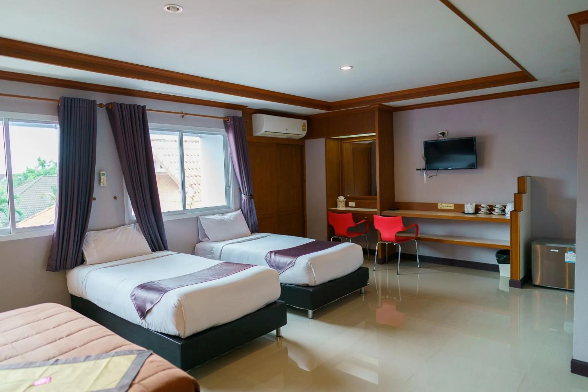 Bed in Thungtawan Hotel