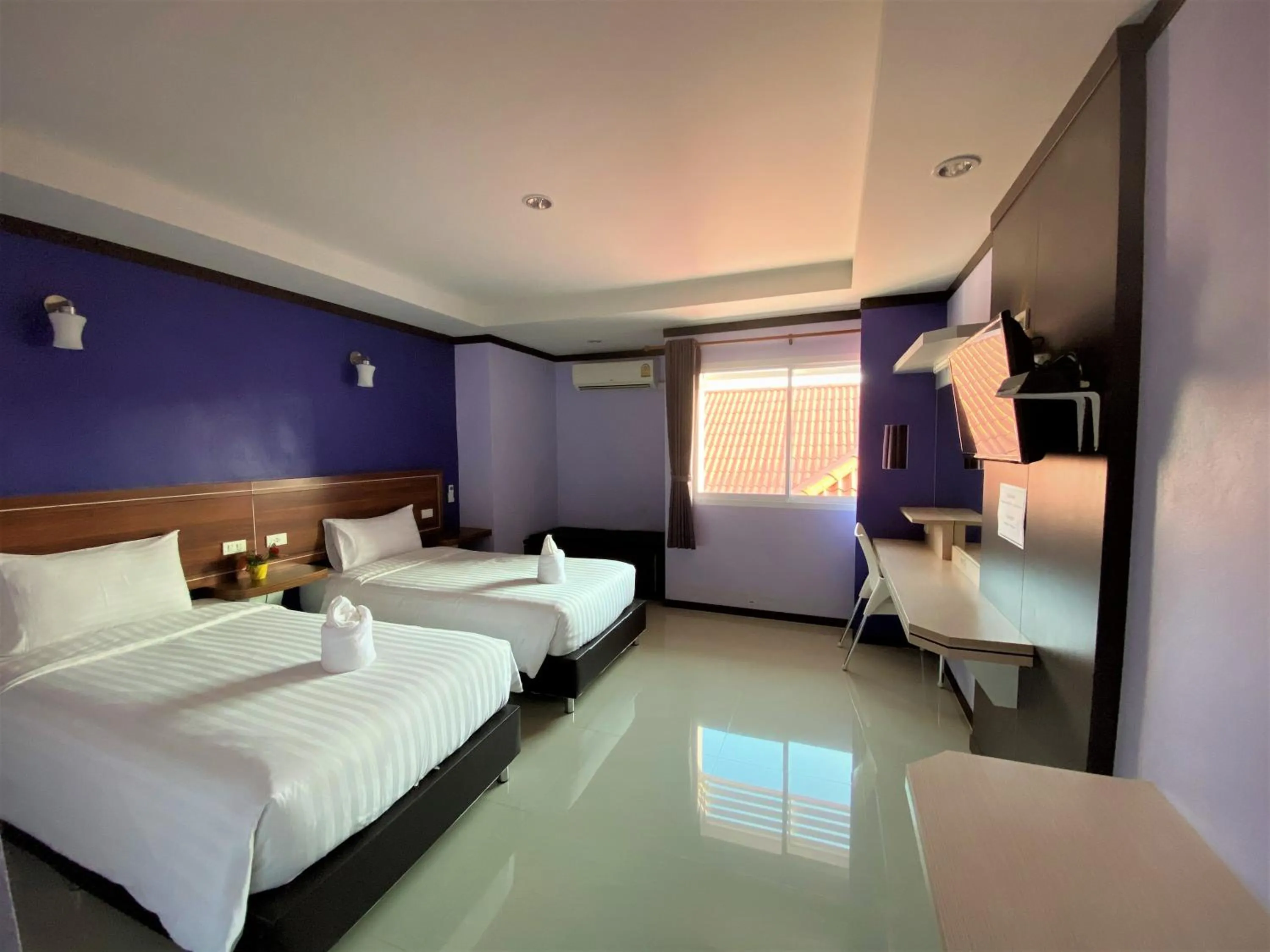 Bed in Thungtawan Hotel