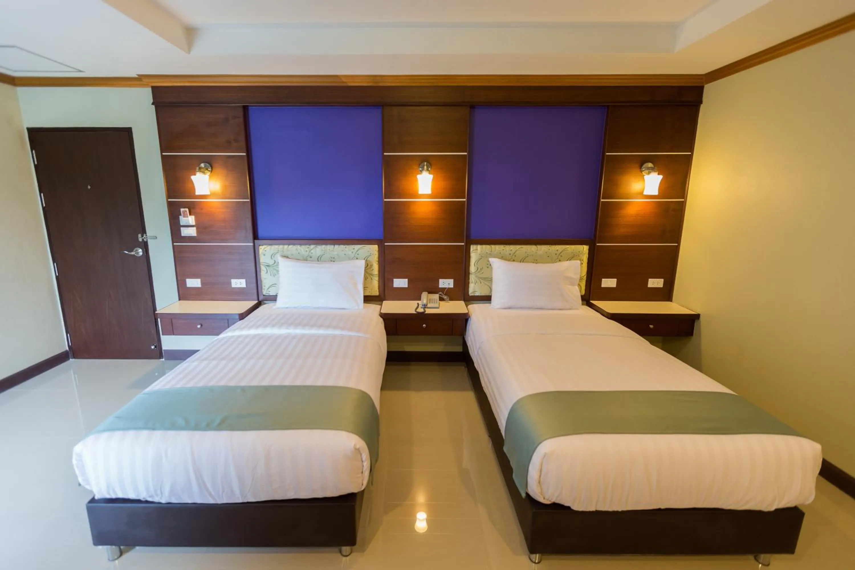 Bed in Thungtawan Hotel