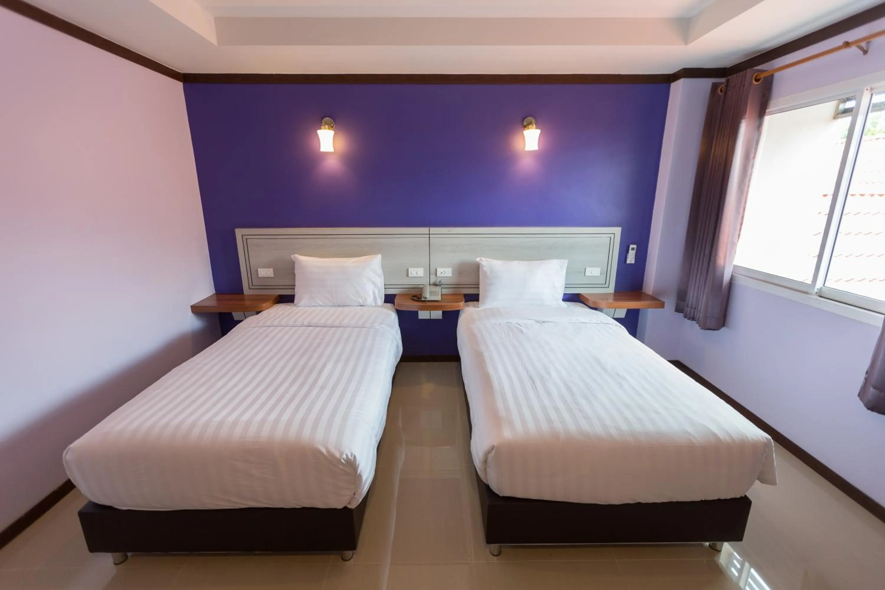 Bed in Thungtawan Hotel