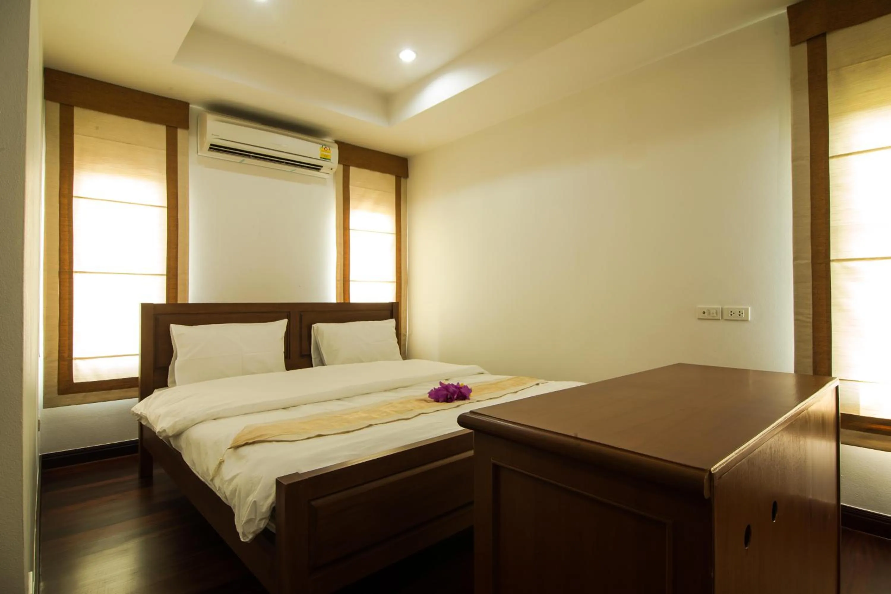 Bed in Thaihome Resort