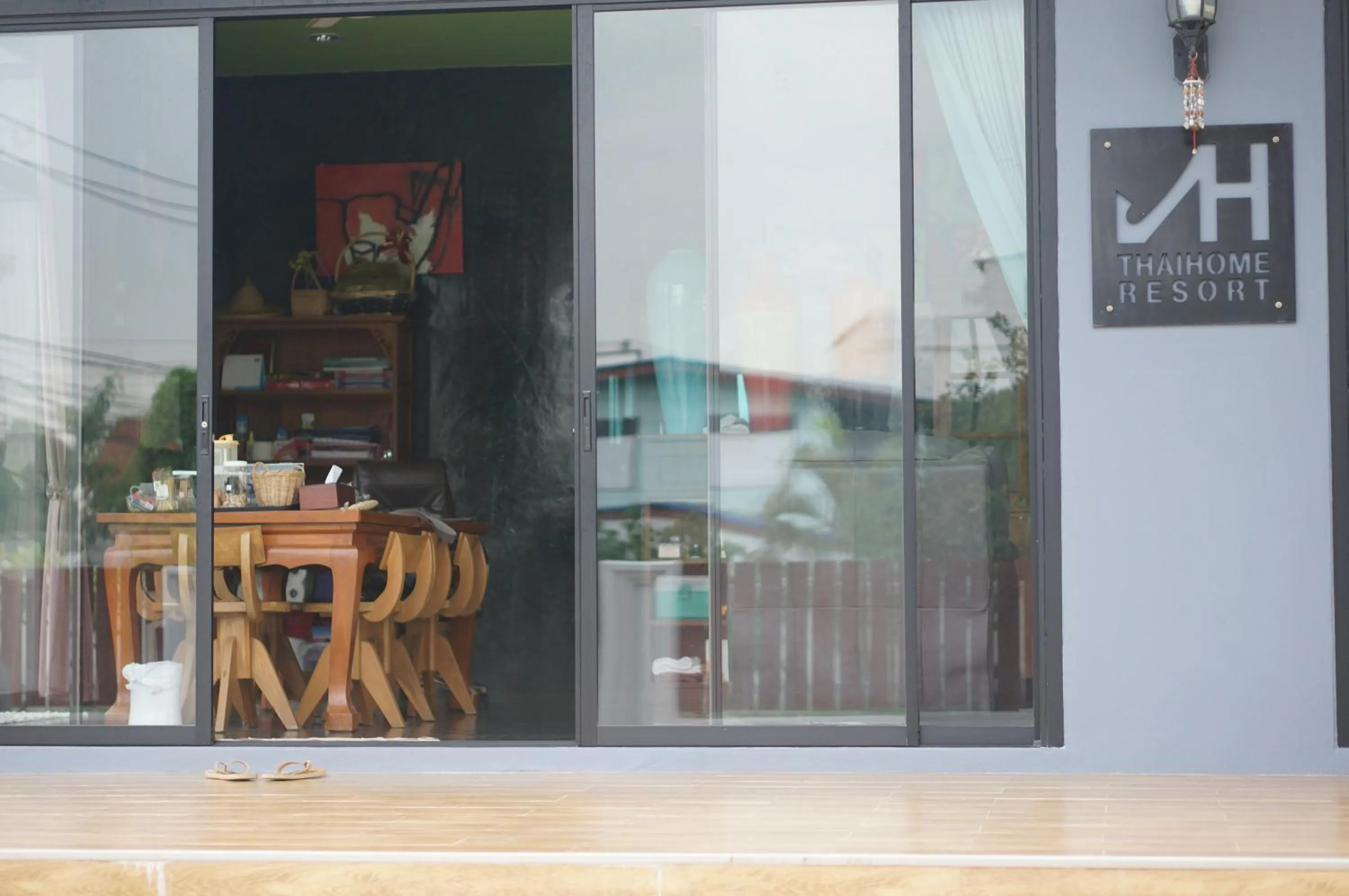 Property logo or sign in Thaihome Resort