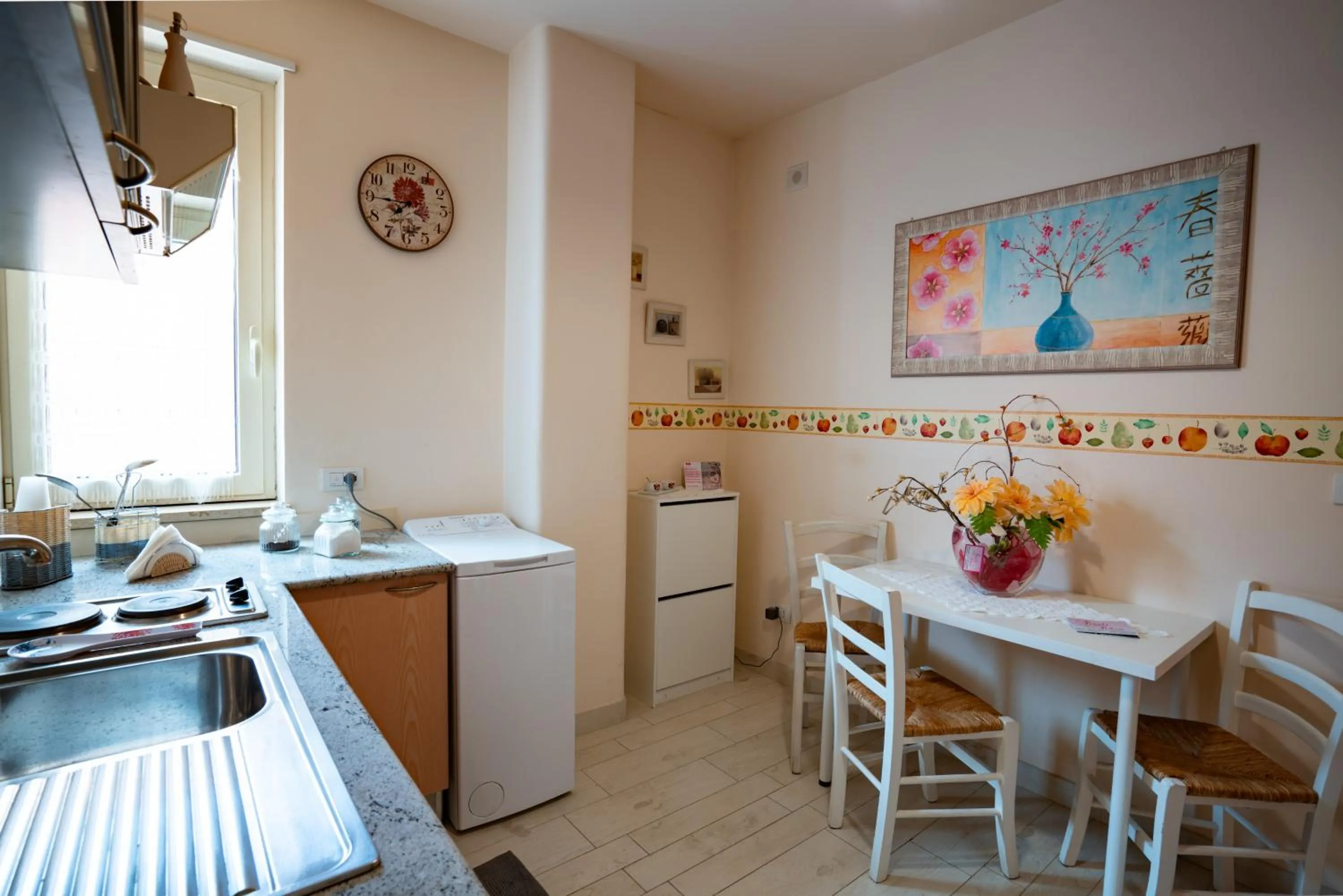 Kitchen or kitchenette in Petali Rosa