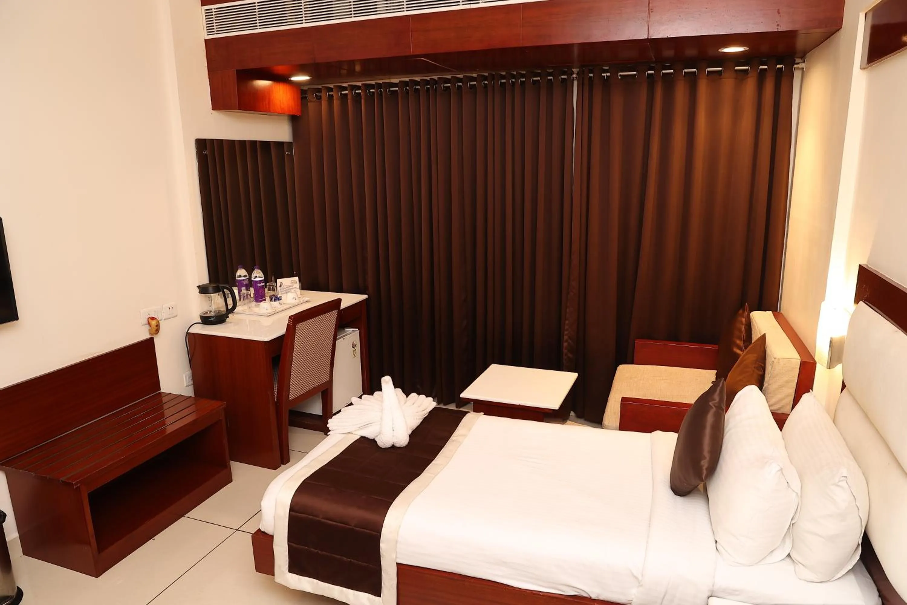 Bed in KTDC Rain Drops Hotel