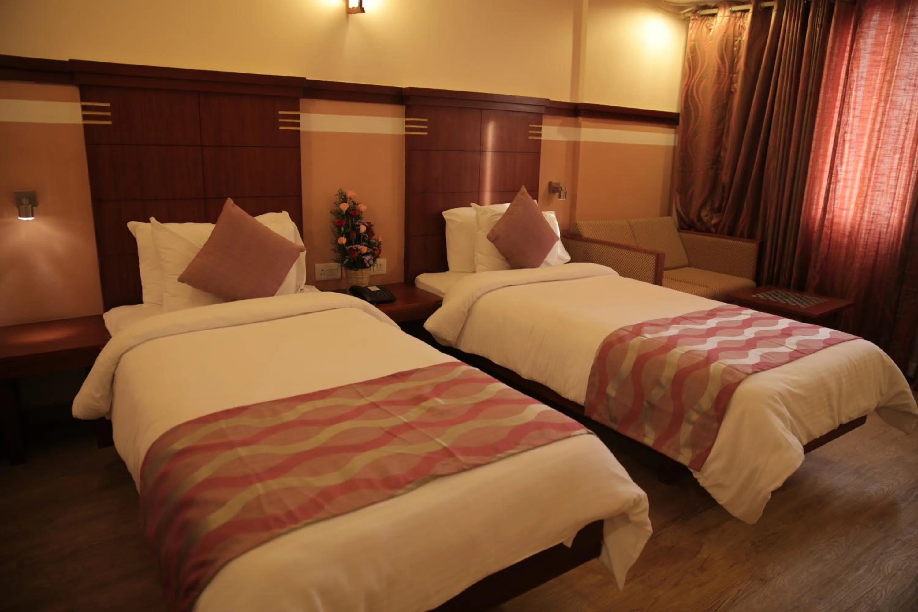 Bed in KTDC Rain Drops Hotel