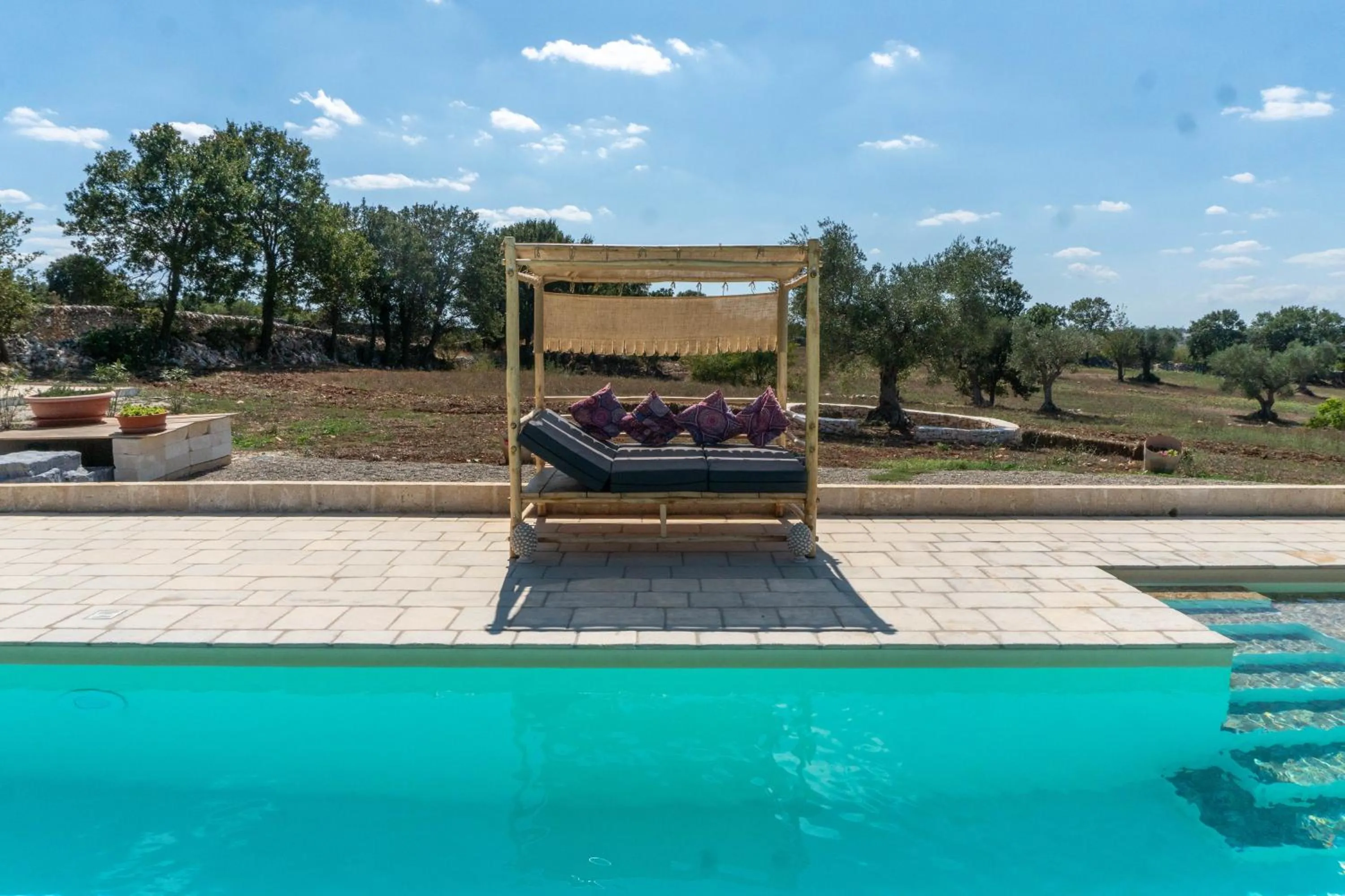 Swimming pool in Trullo Dimora Podere Papilio