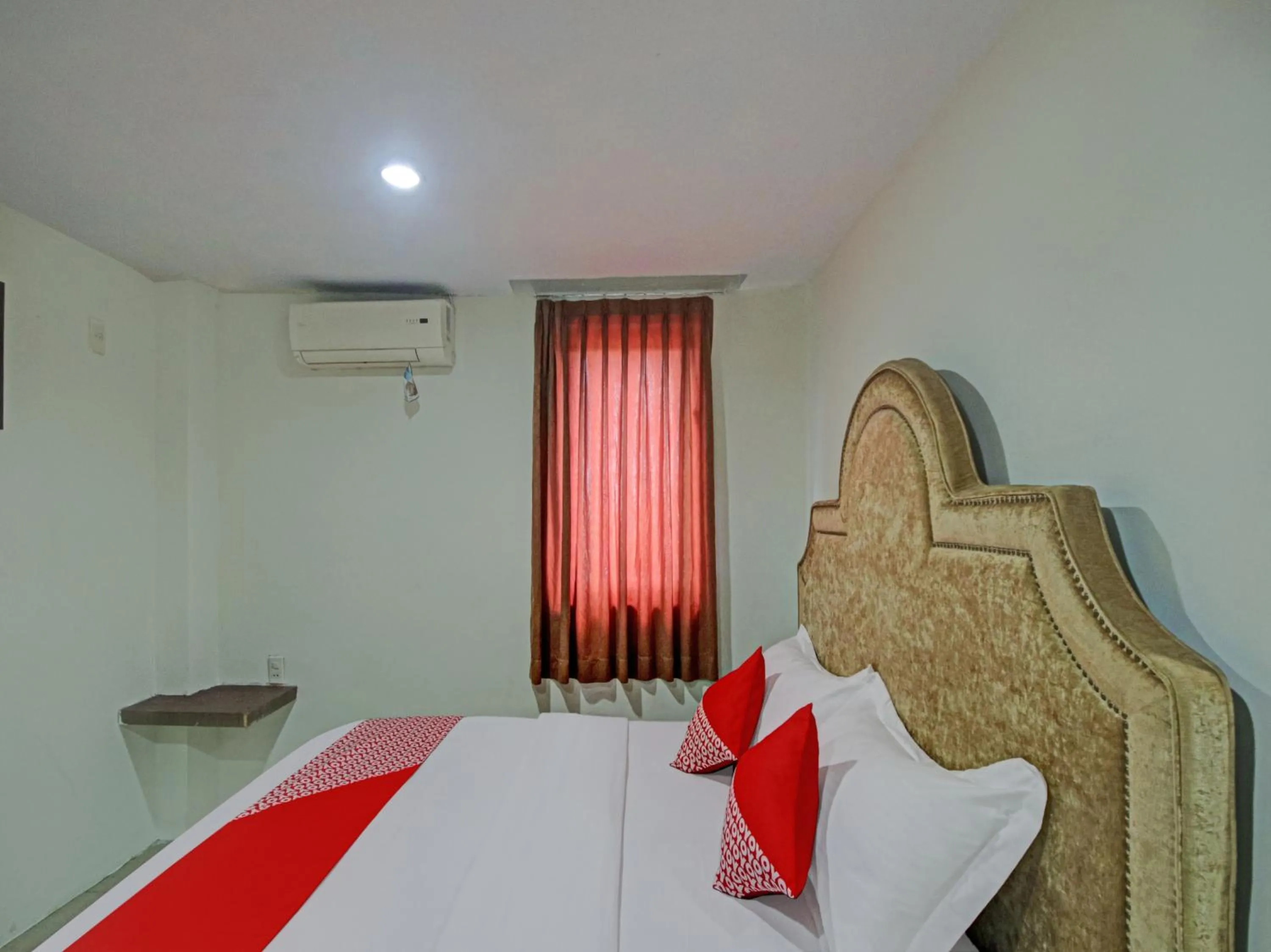 Bedroom in OYO 2574 Z Suites Hotel