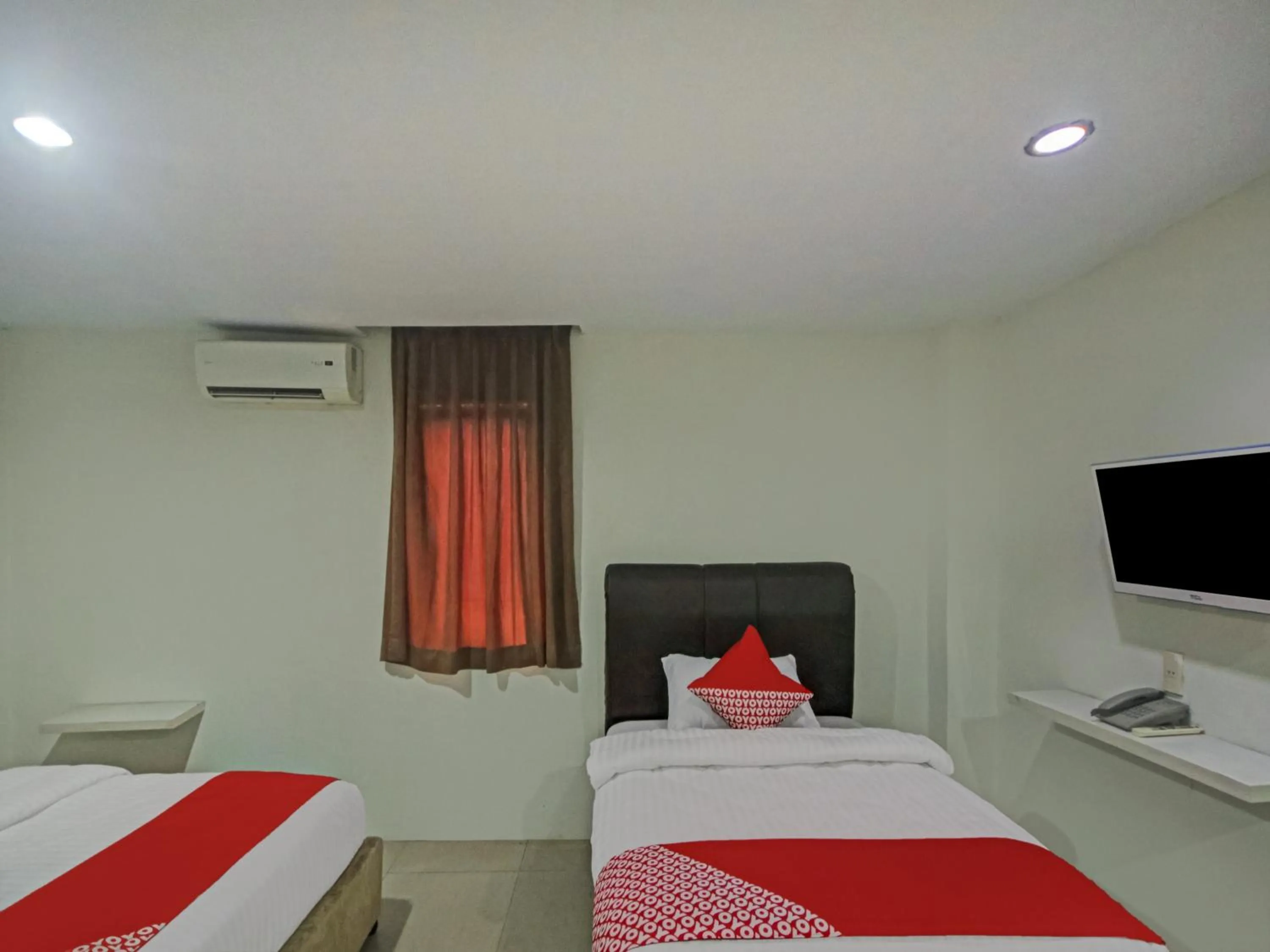 Bedroom in OYO 2574 Z Suites Hotel